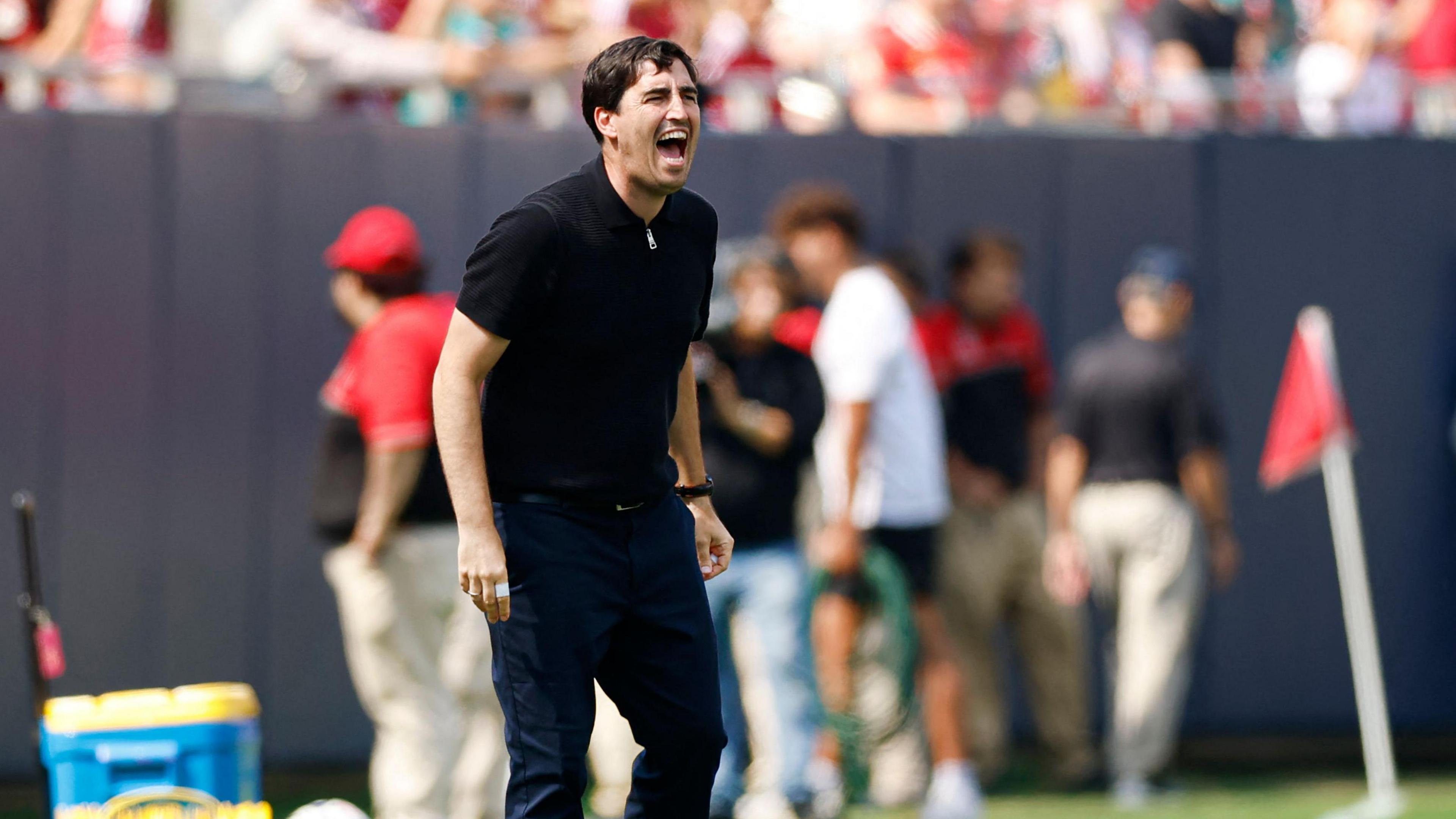 Andoni Iraola shouts instructions at his Liverpool players during a pre-season friendly against Leeds