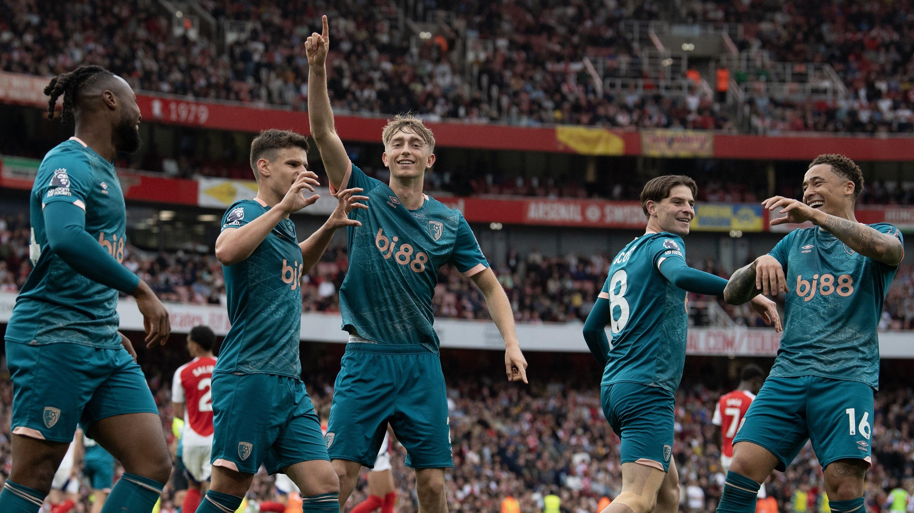 Bournemouth players celebrate a goal at Arsenal in 2025