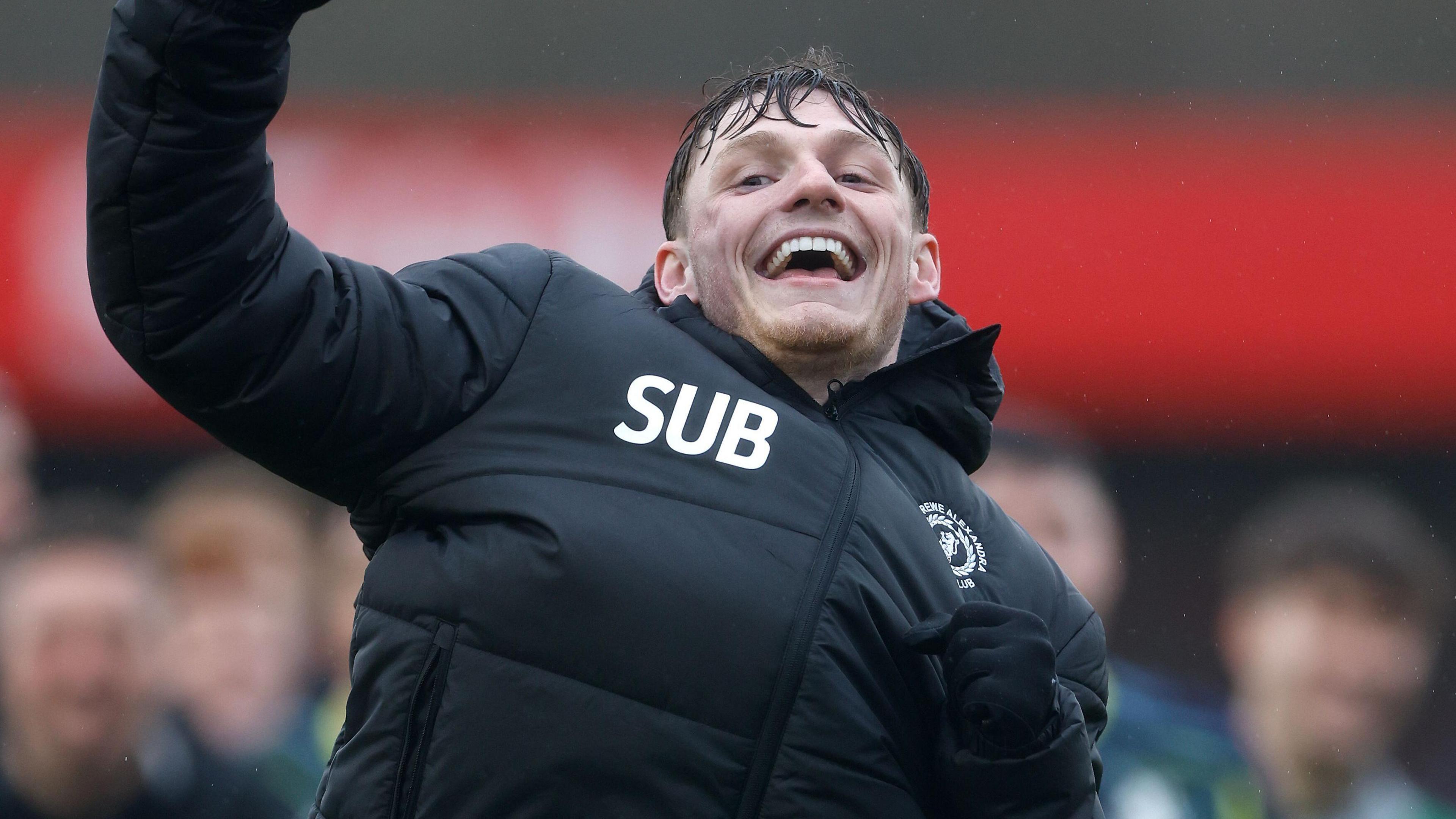 Tommi O'Reilly celebrates after his sixth goal of the season gave Crewe victory