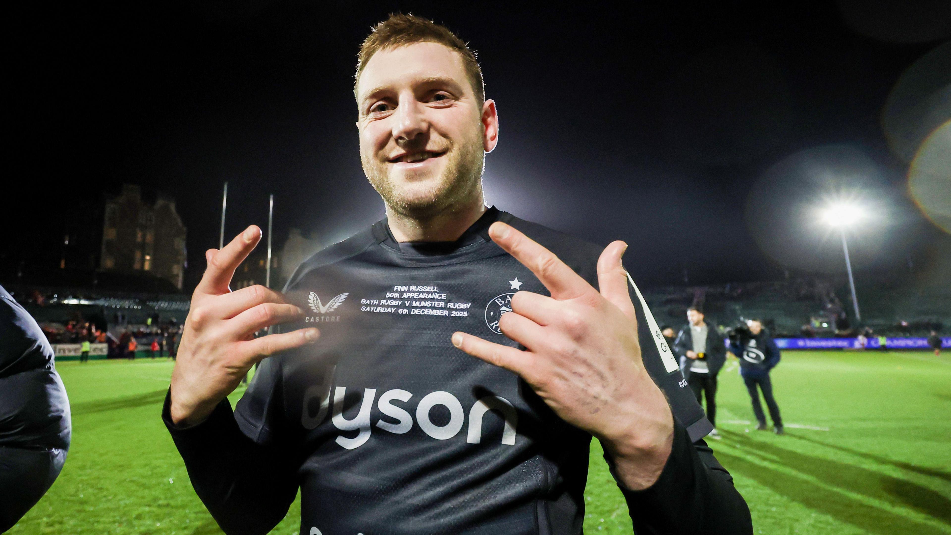 Finn Russell celebrates Bath's win over Munster