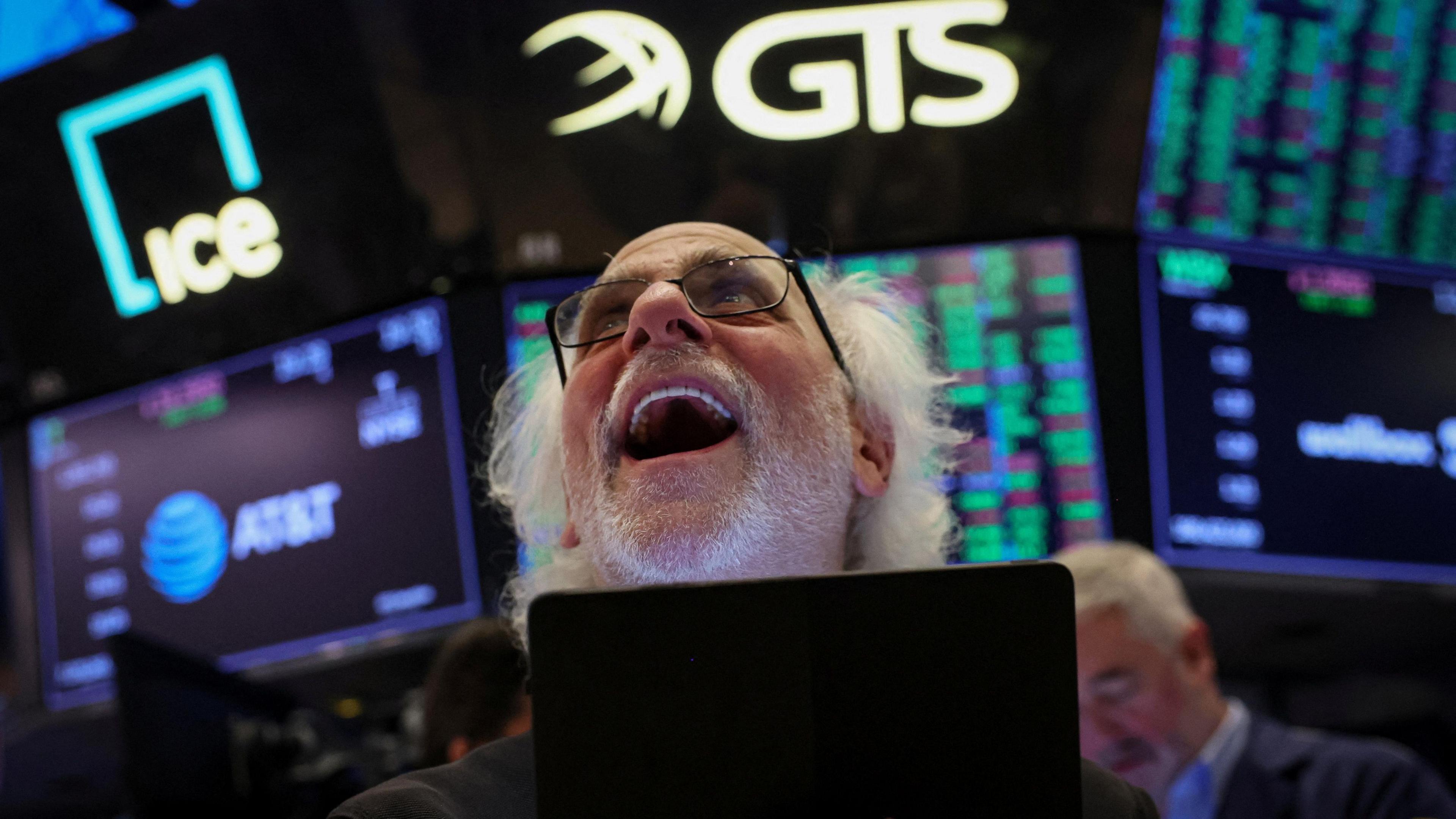 Traders work on the floor at the New York Stock Exchange.