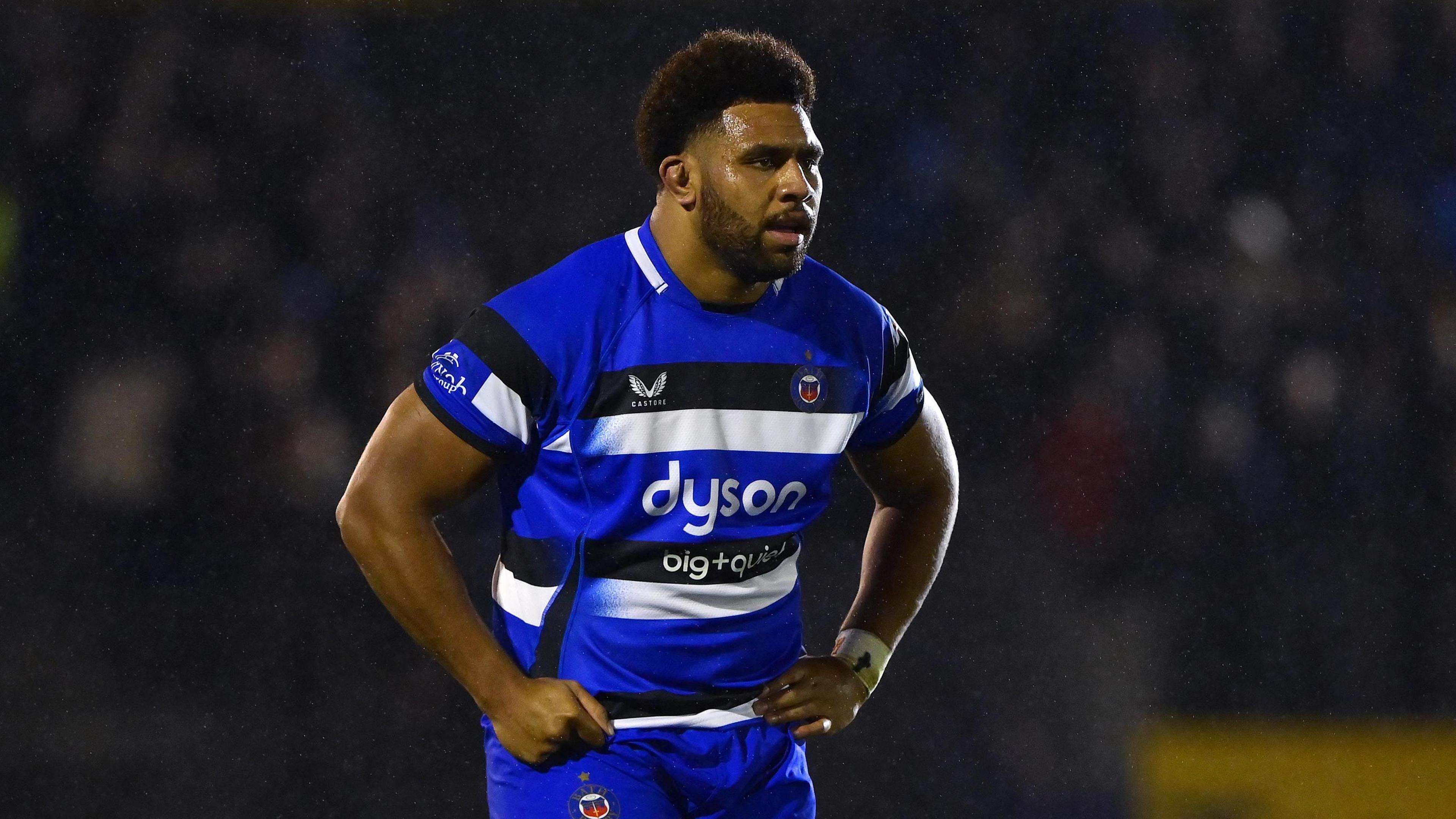 Vilikesa Sela standing with his hands on his hips on the pitch during a match for Bath