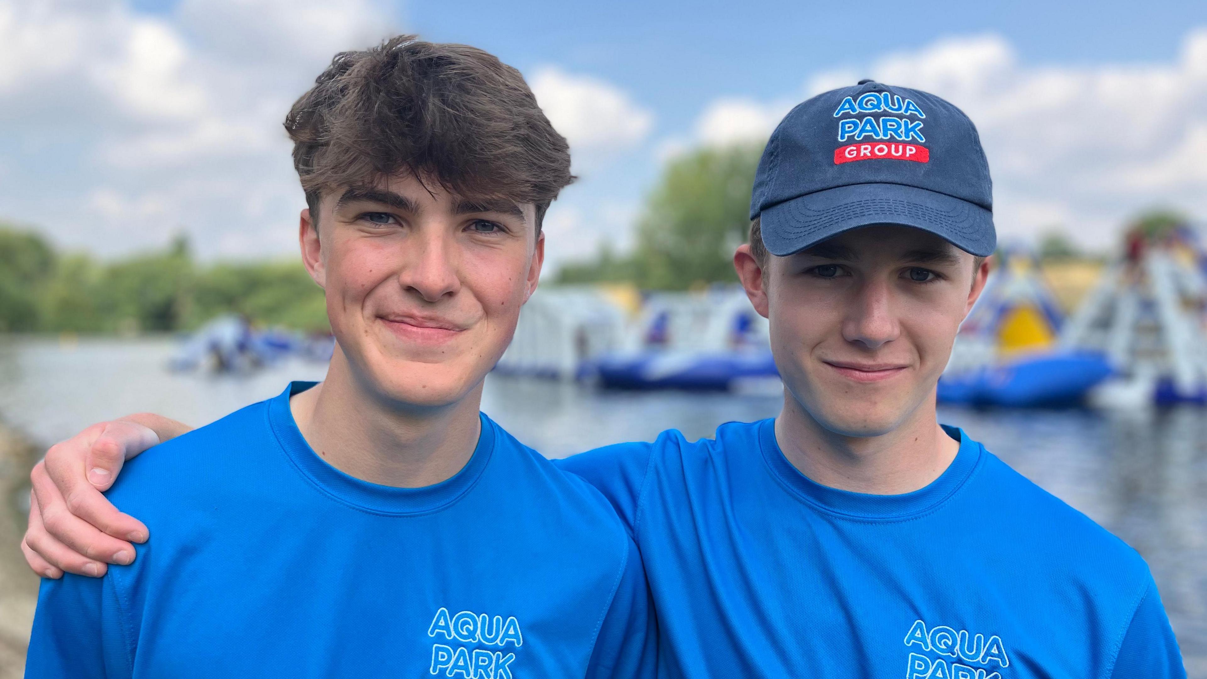 Lifeguards George Pollard (right) and his colleague Reuben Hutchinson both wearing blue Aqua Park branded t-shirts