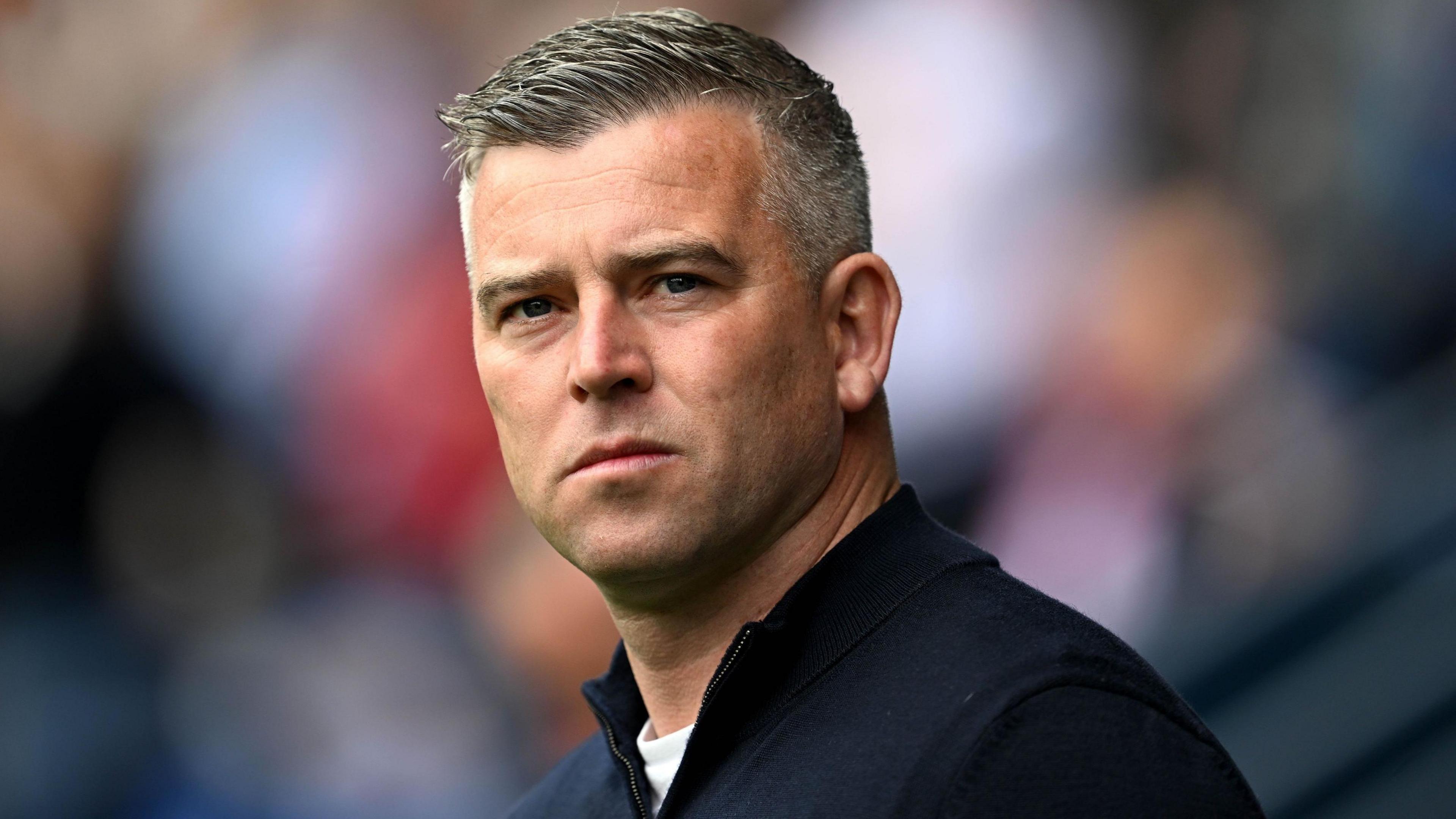 Steven Schumacher looks on during Bolton's game against Luton