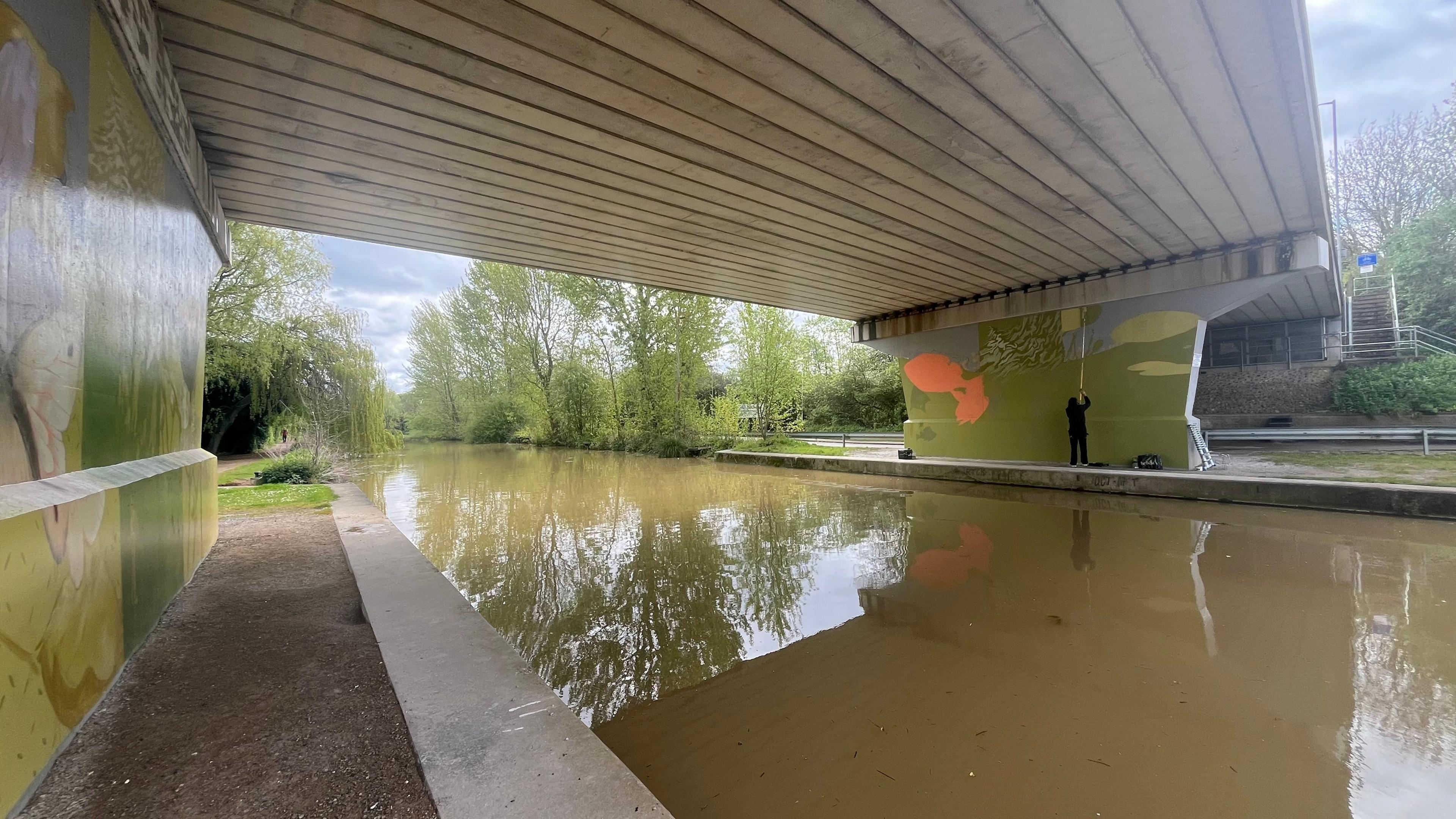 A view of the Beverley beck with local artist, Emma Garness, painting in the distance