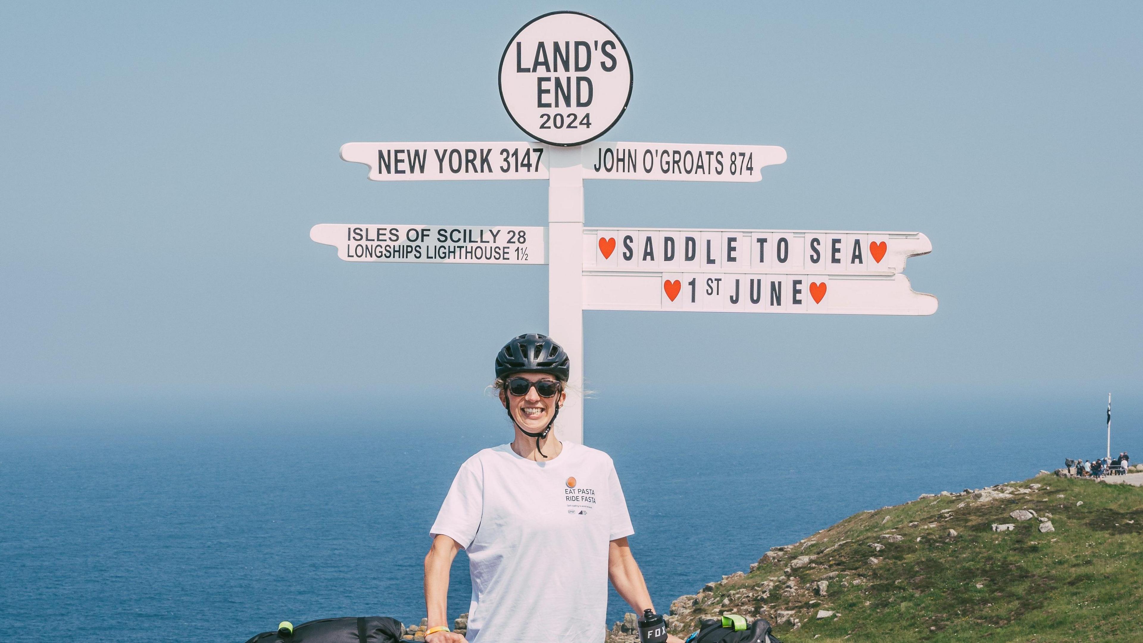 Katy Roberts at Land's End on the first day of her challenge