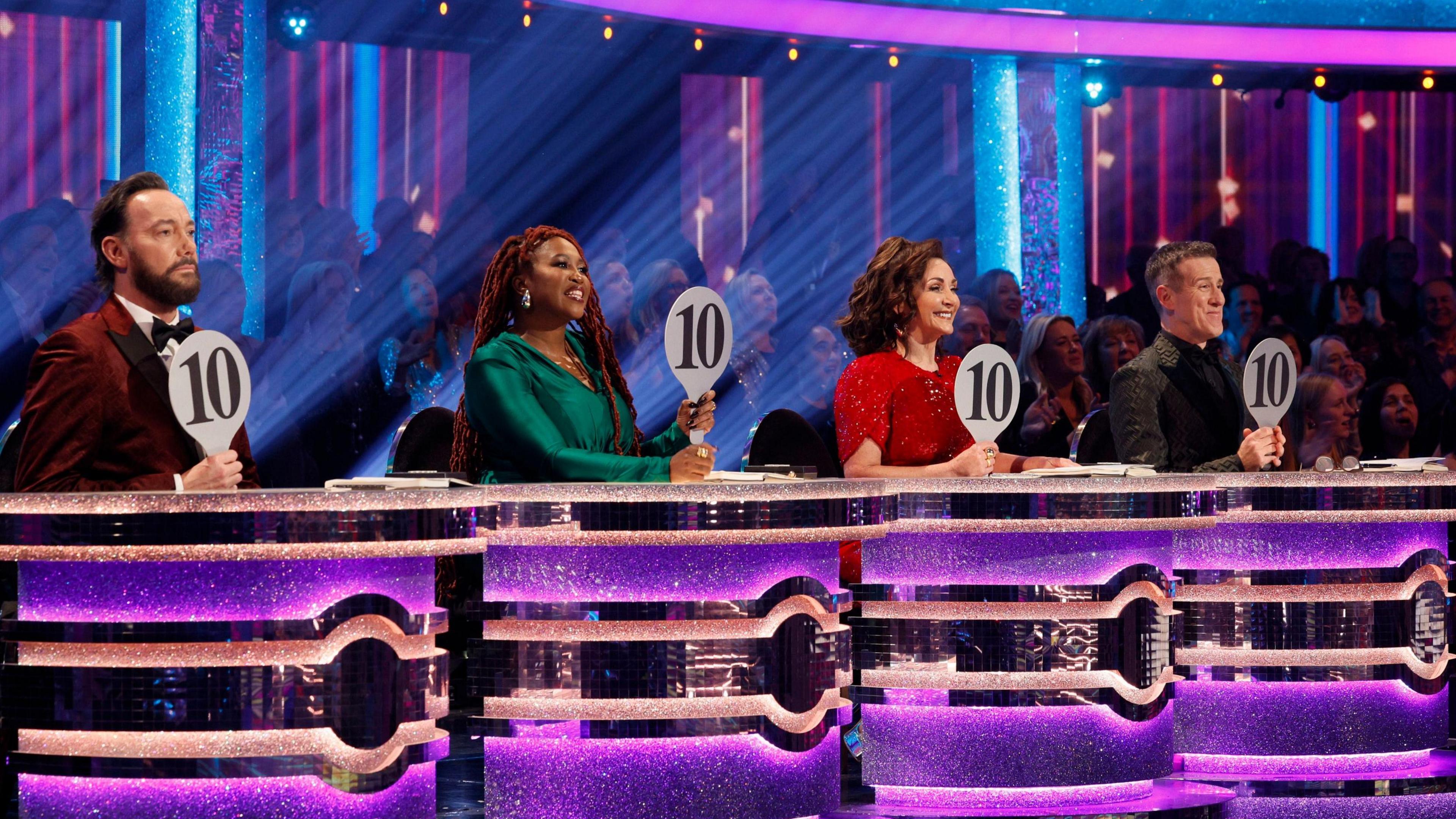 All four Strictly judges holding up a '10' paddle