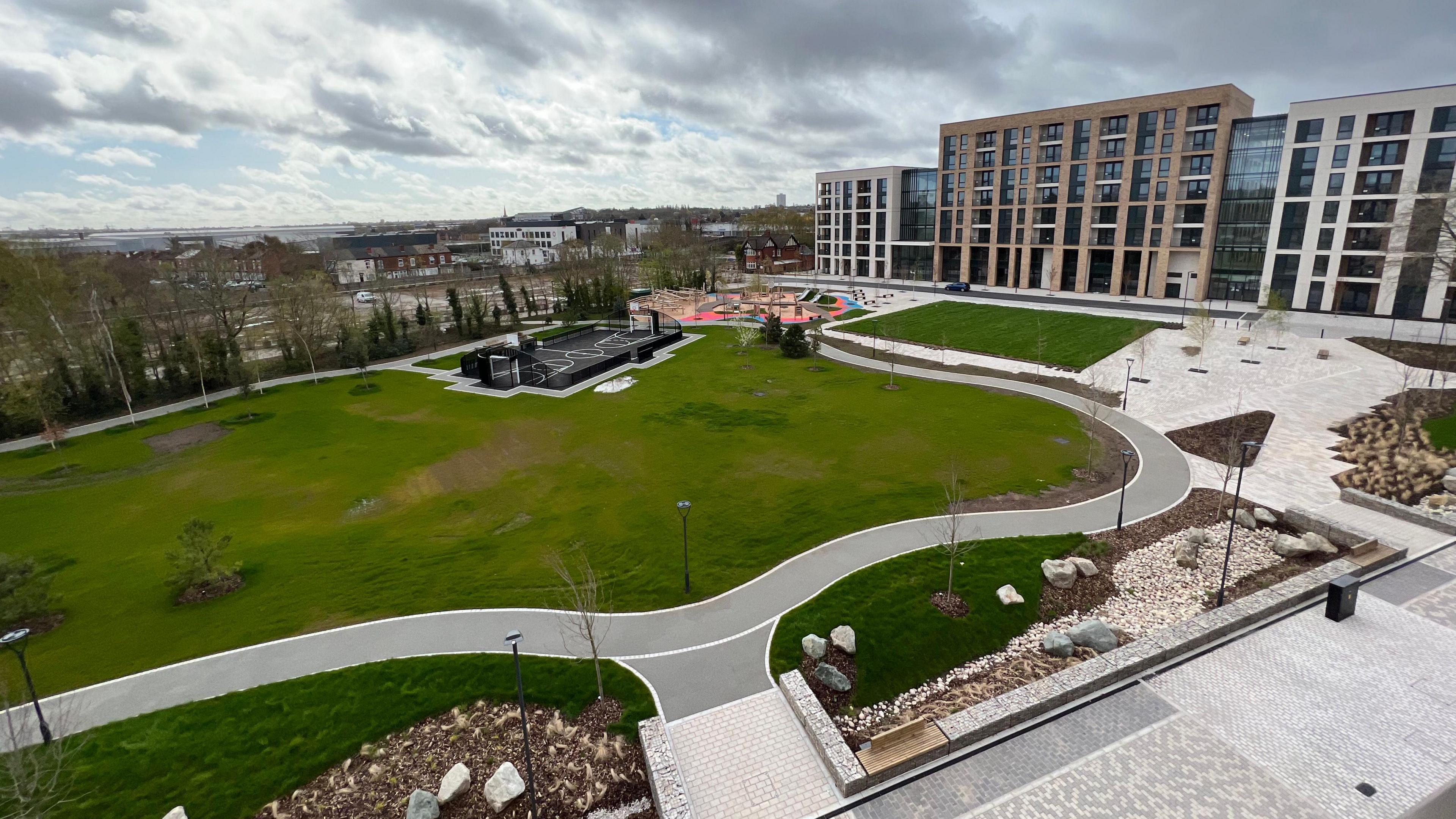 Image showing apartments at the site of the planned Athlete's Village. They have been empty since they were completed in 2023.