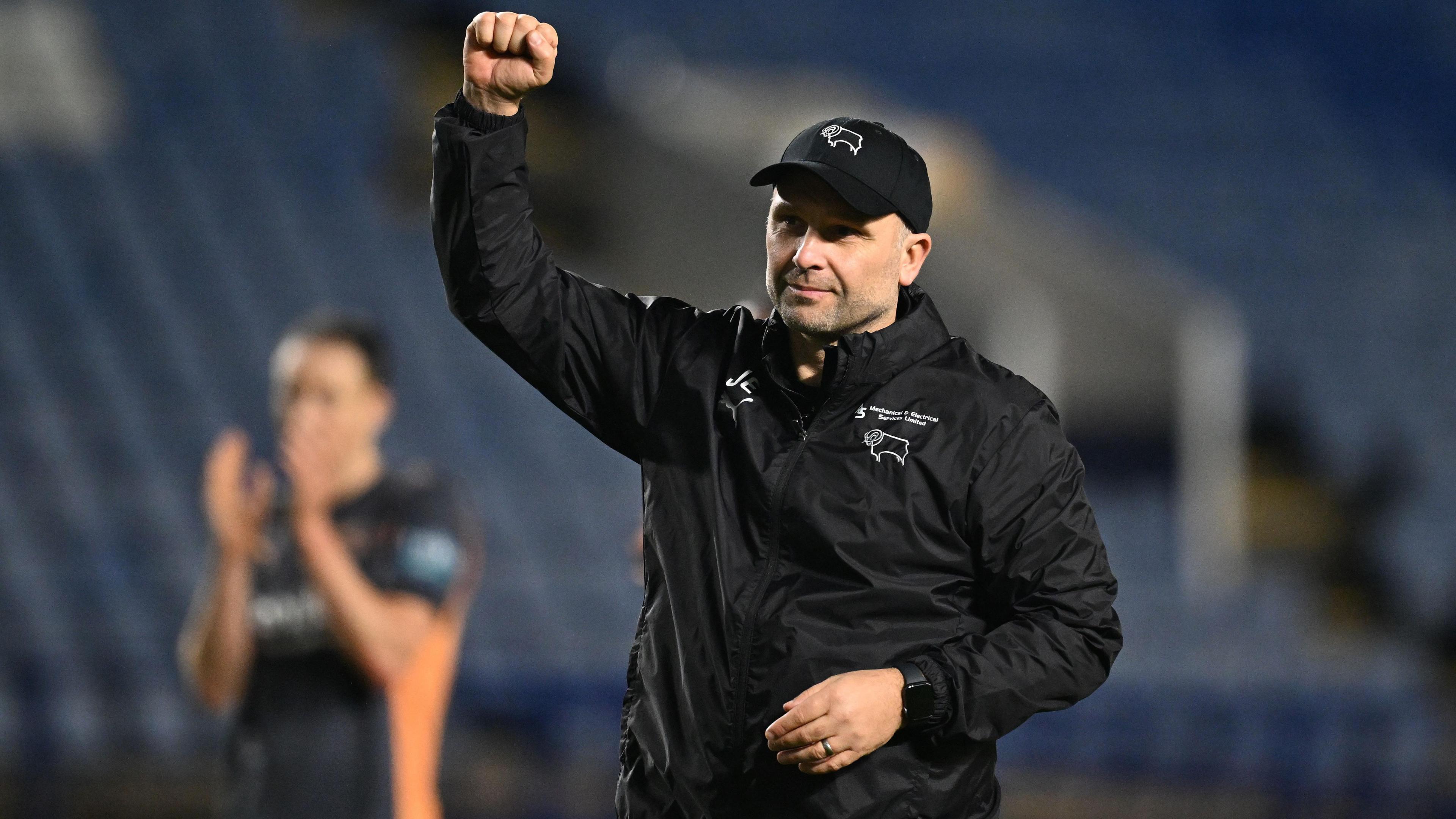 Derby boss John Eustace with his fist in the air after their recent win at Sheffield Wednesday