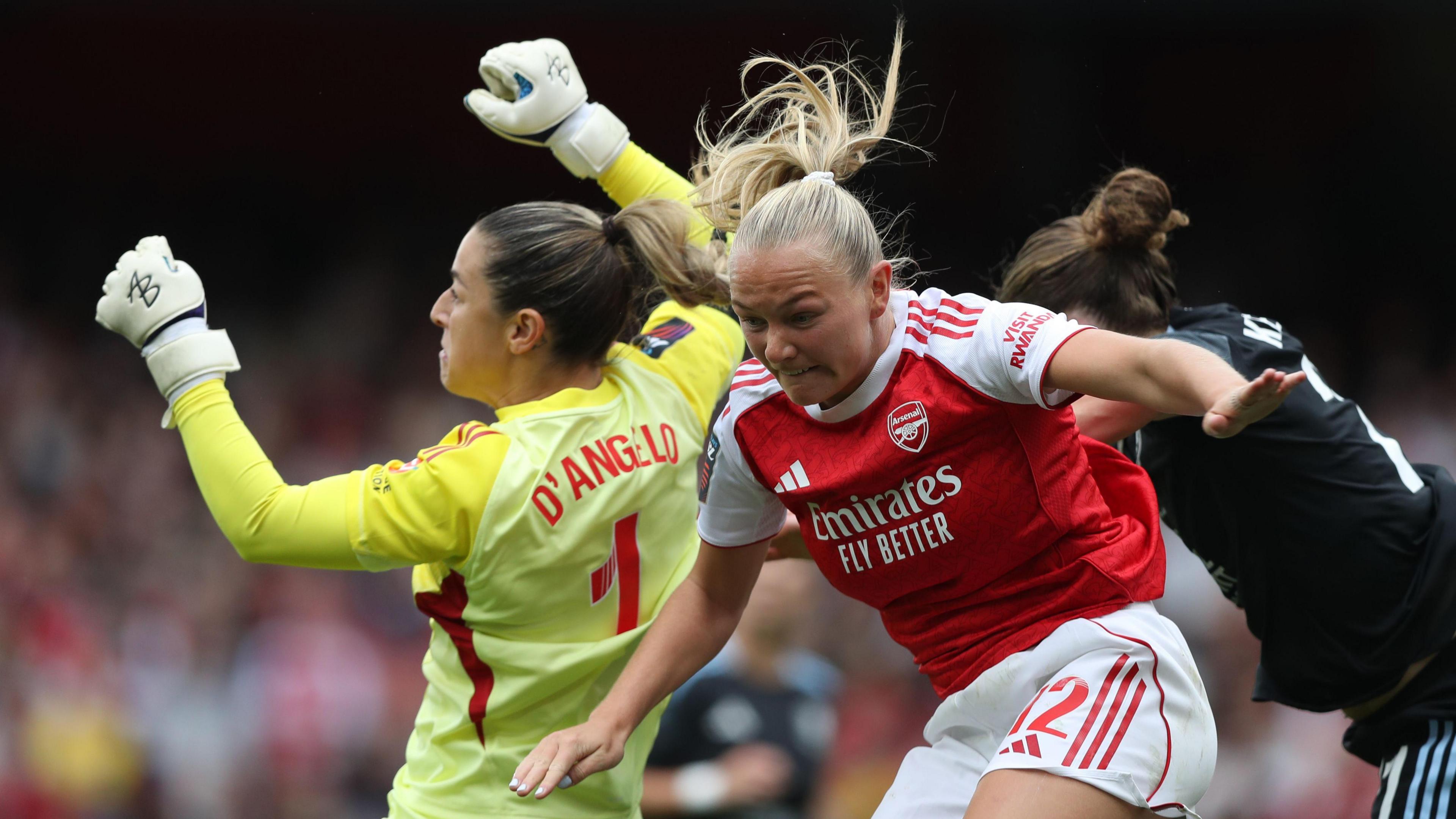 Frida Maanum jumps for a header