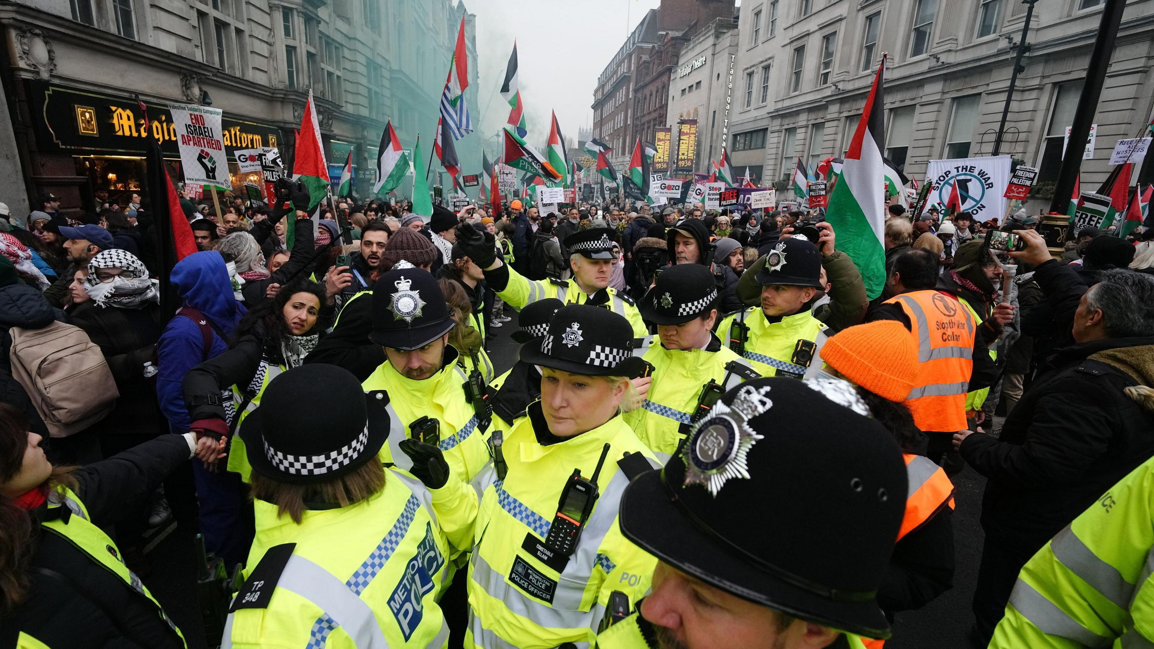 Police officers among the crowd of a pro-Palestine protest