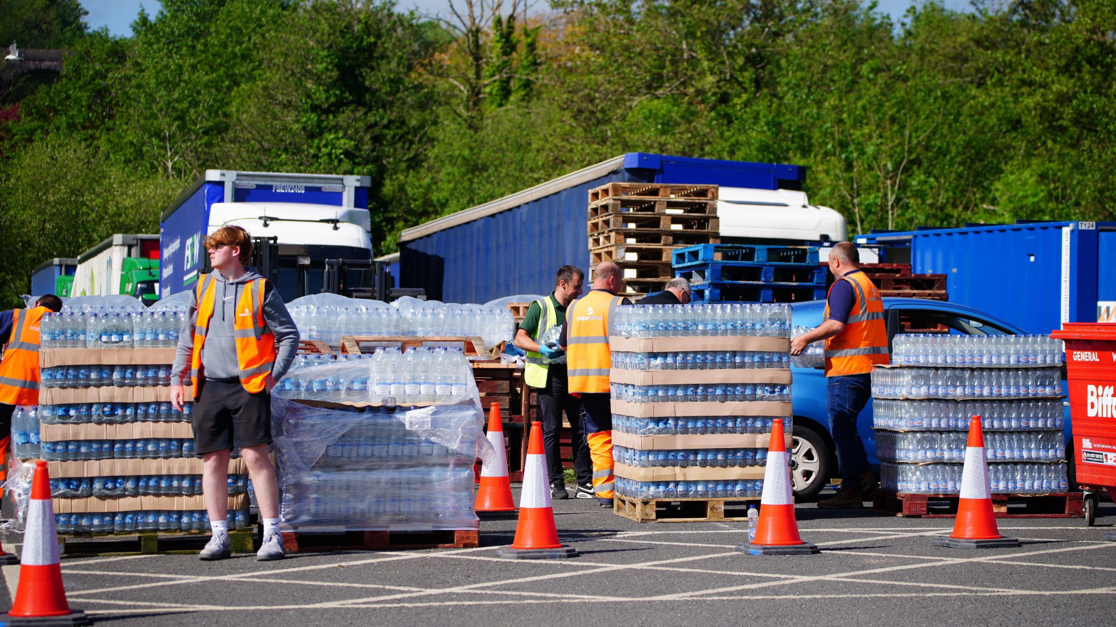 Bottled water being handed out