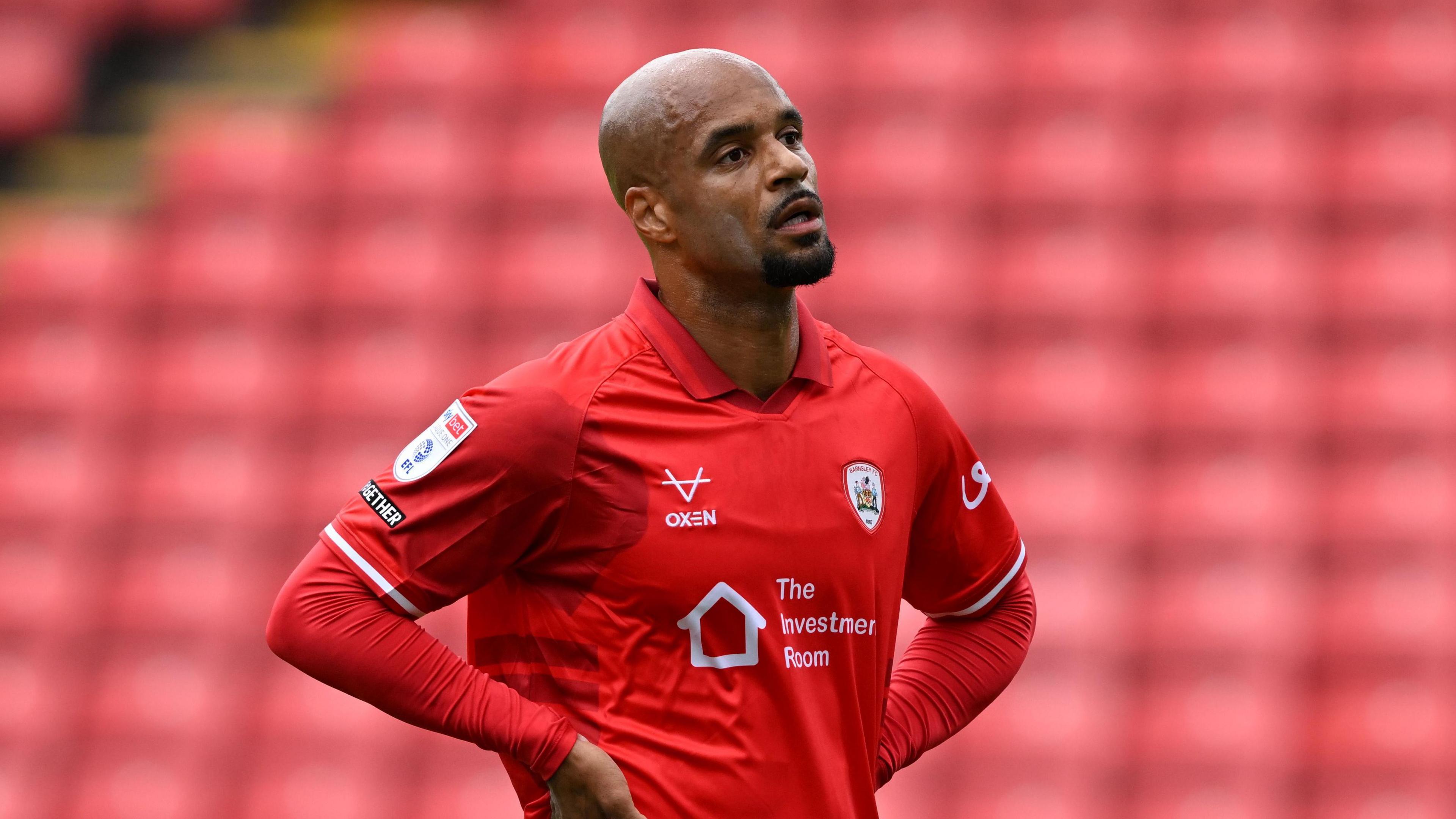 David McGoldrick in the red shirt of League One club Barnsley