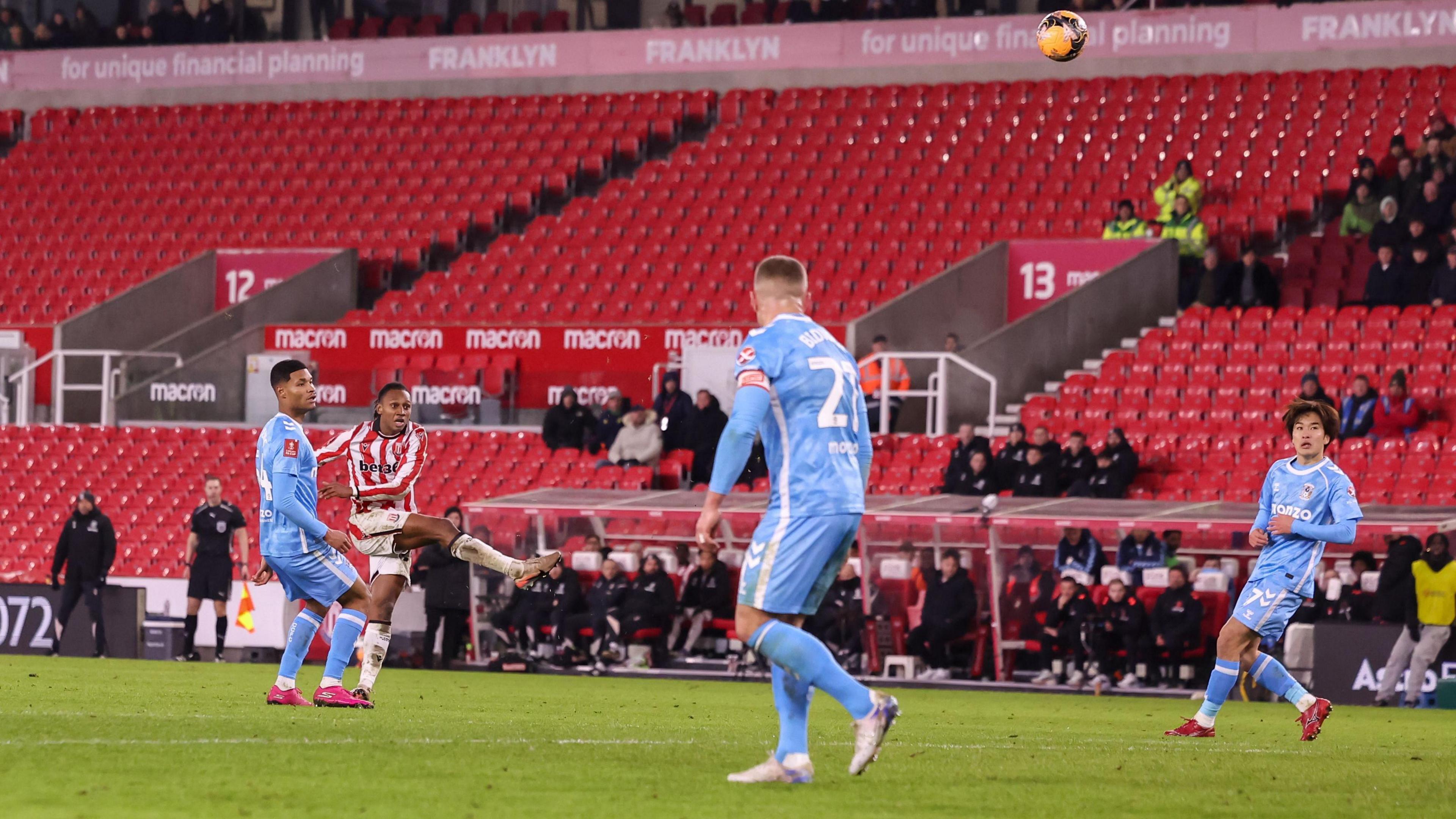 Stoke City's Lamine Cisse scores