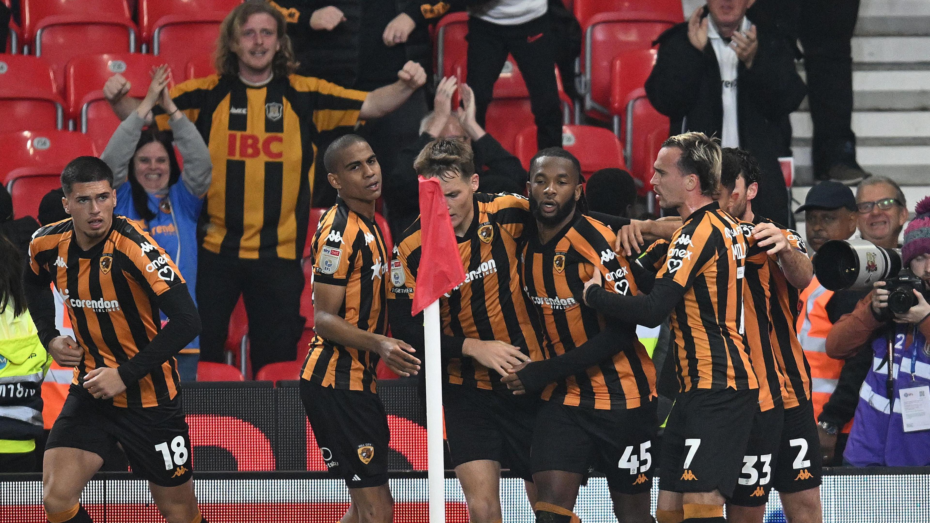 Hull celebrate after Kasey Palmer's penalty equaliser at the bet365 Stadium