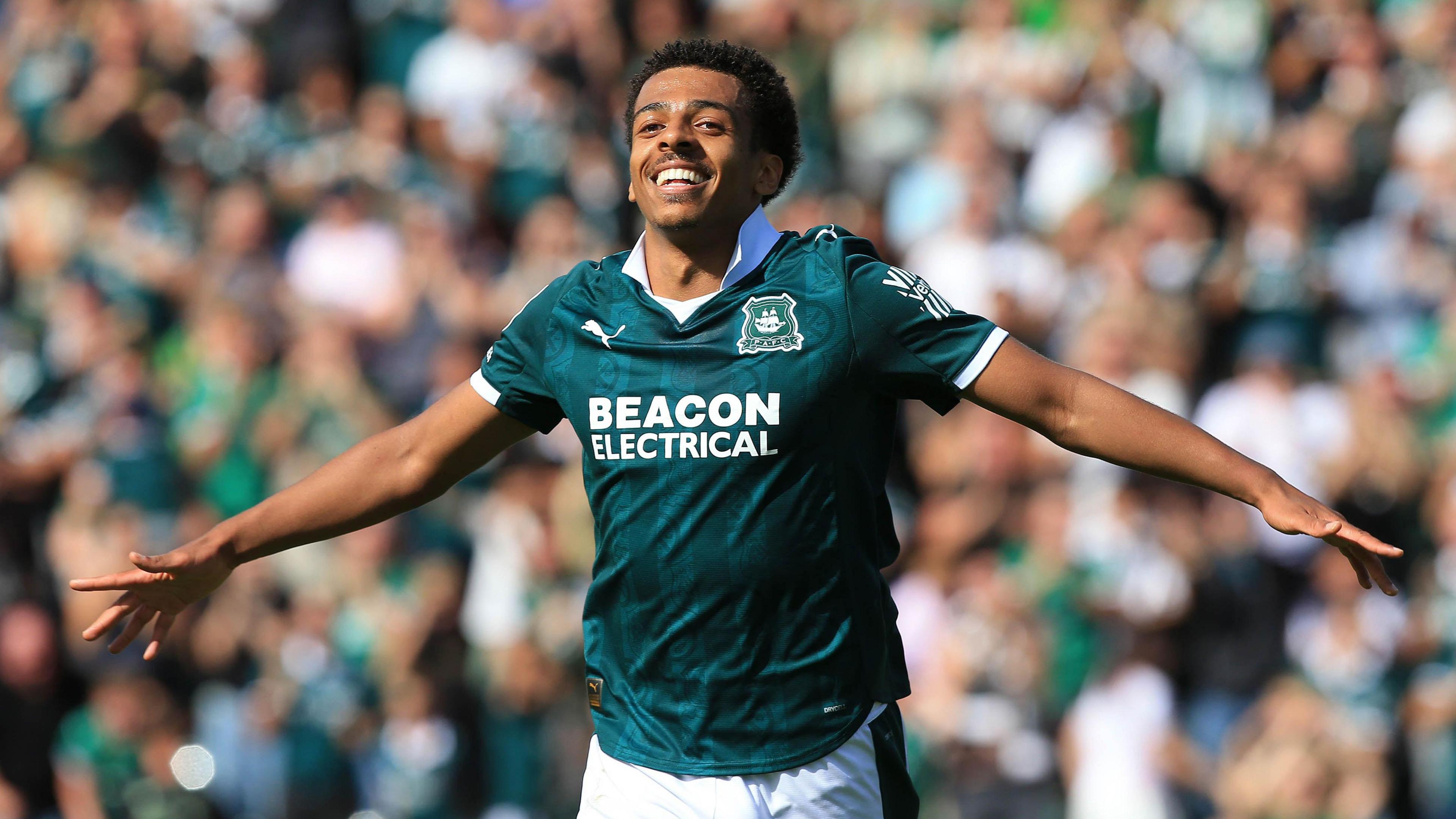 Caleb Watts celebrates