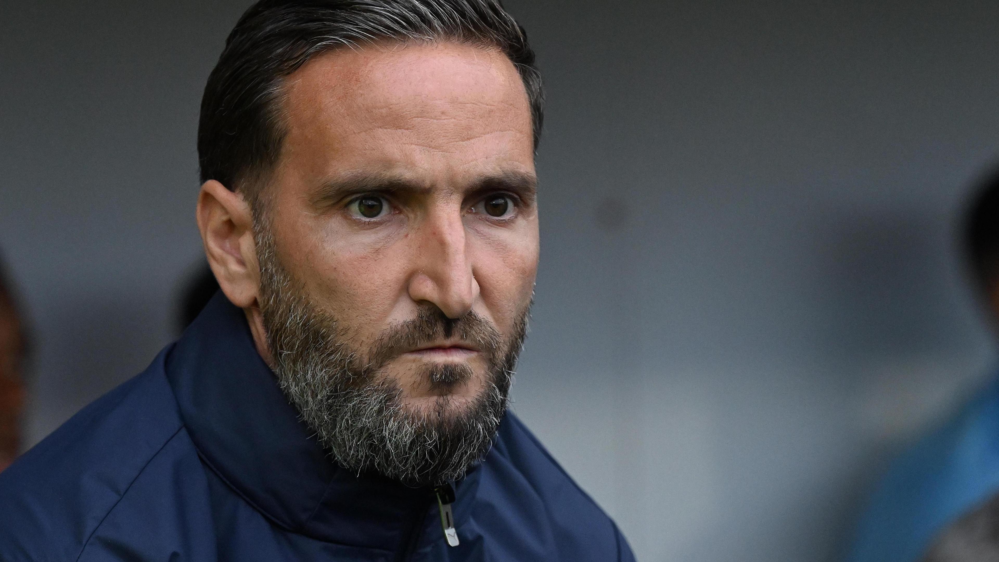 Notts County head coach Martin Paterson looks on