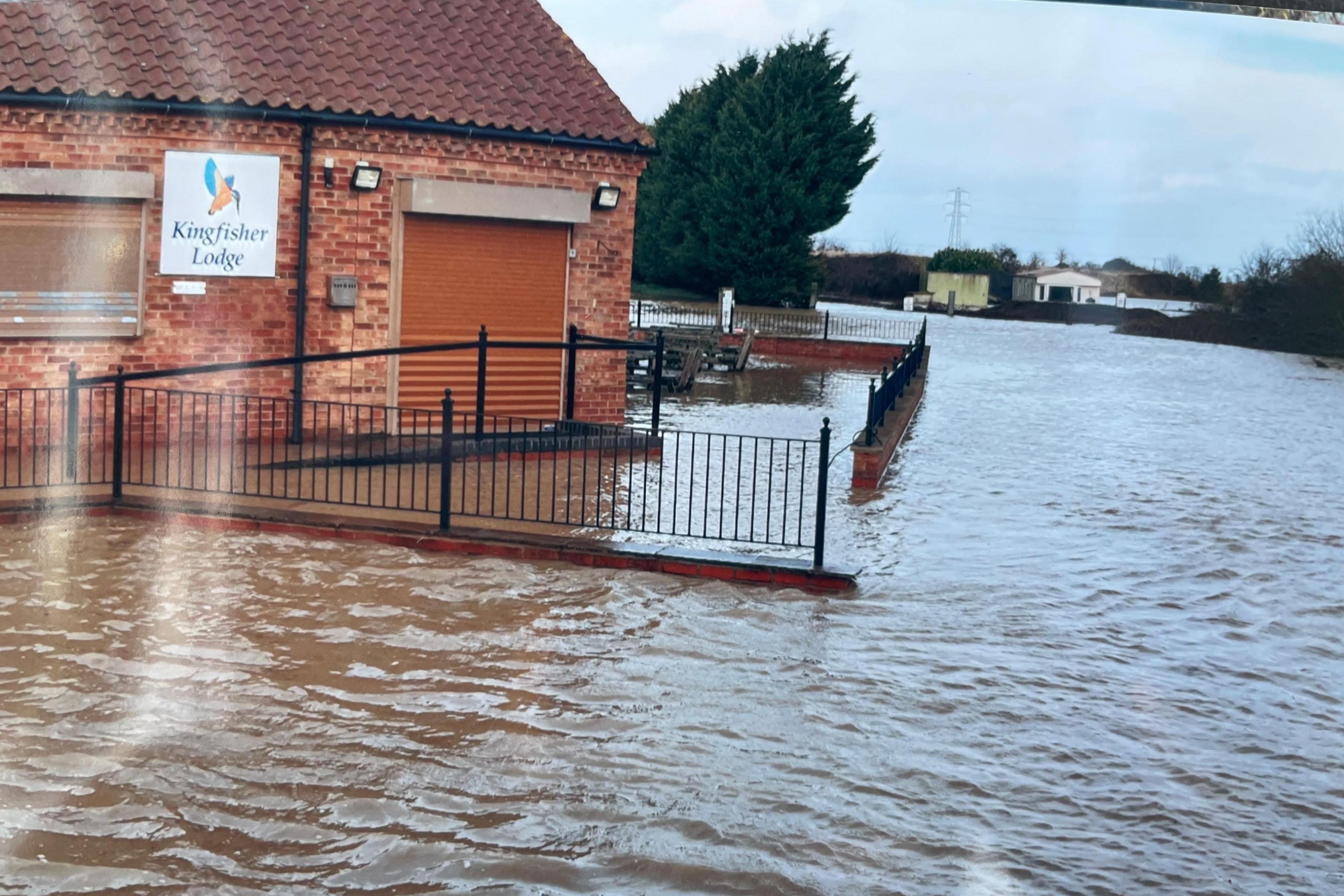 Portland Fish Lake cafe submerged in flood water. 