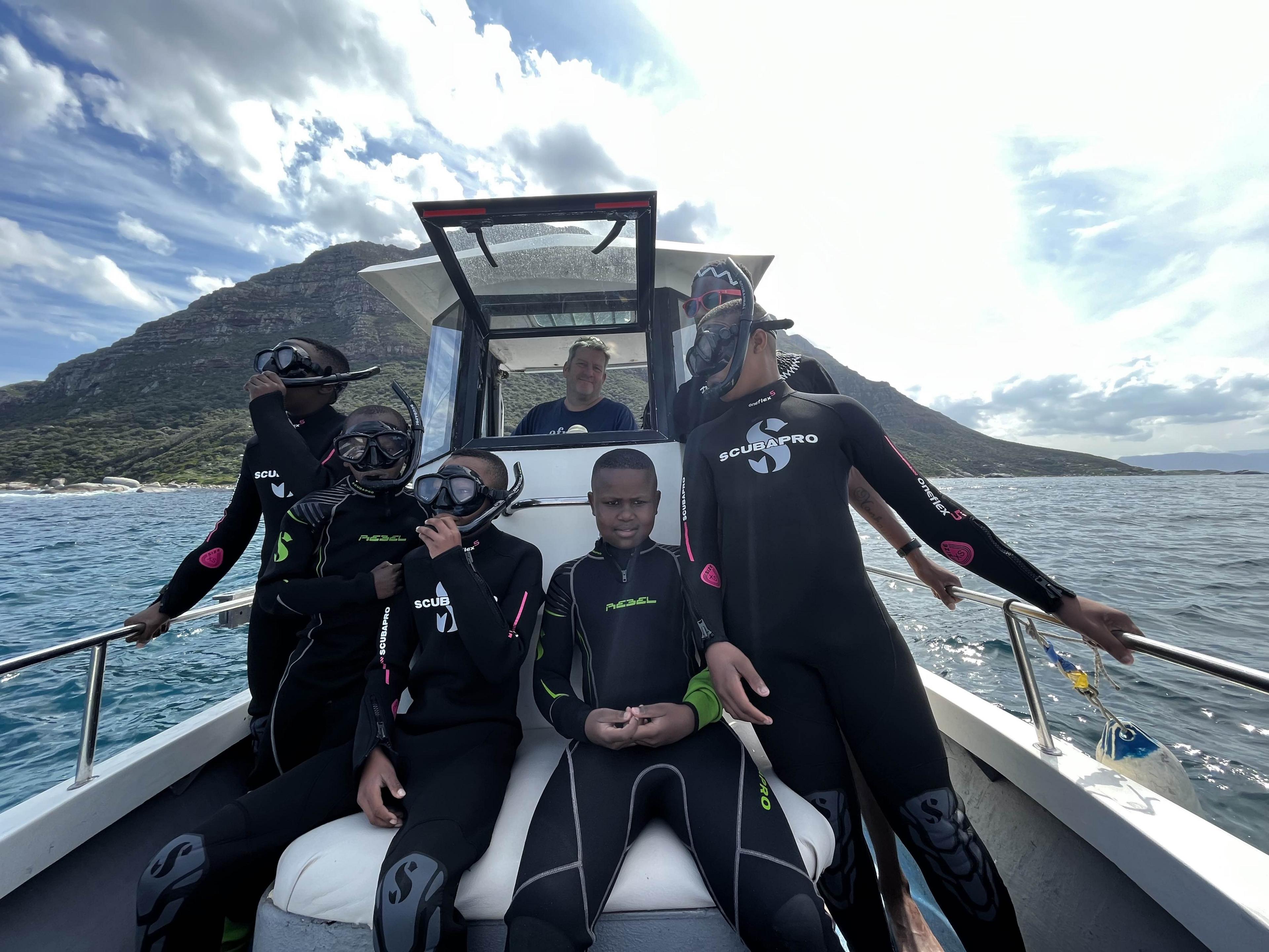 Kinds on a boat in one of Zandile Ndhlovu's training sessions