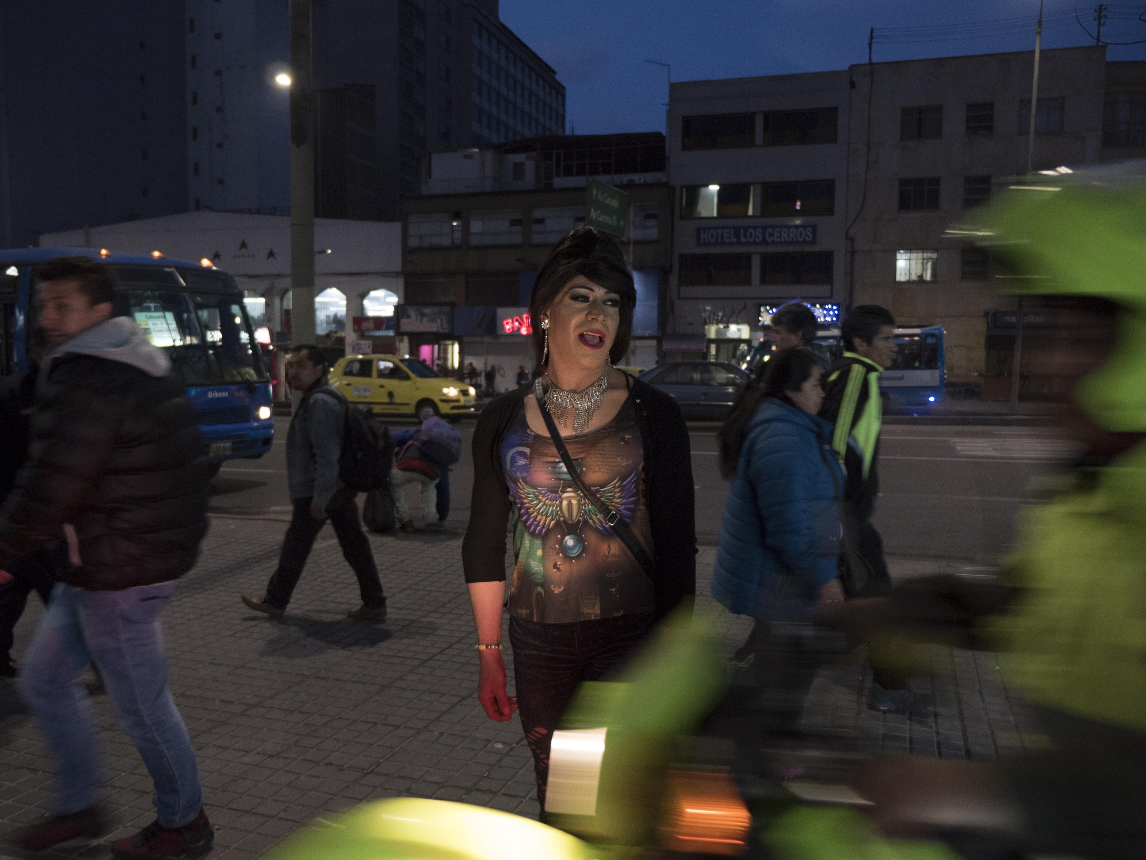 "Yuri" poses on the street outside Tranxtienda