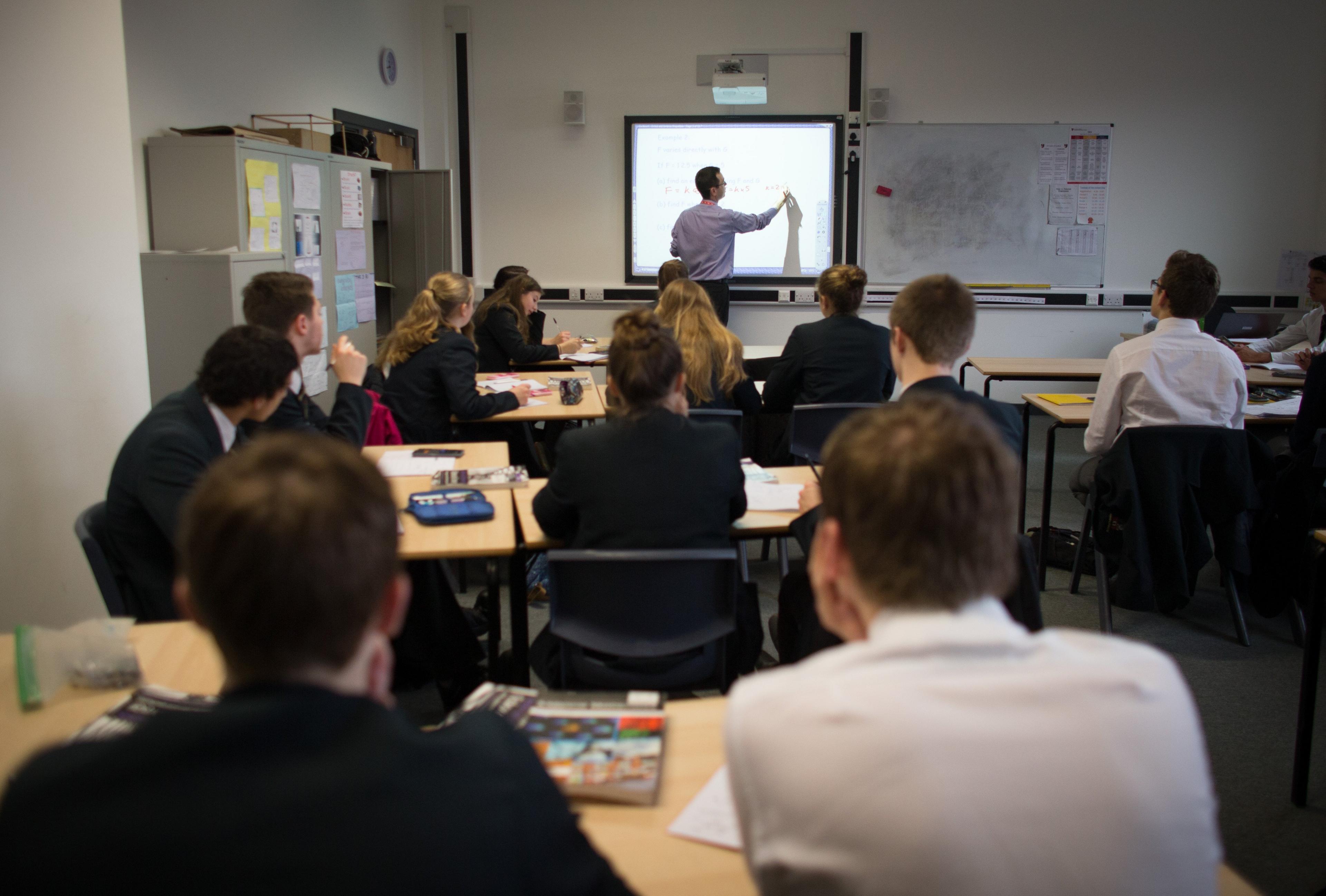 Children at a secondary school being taught.