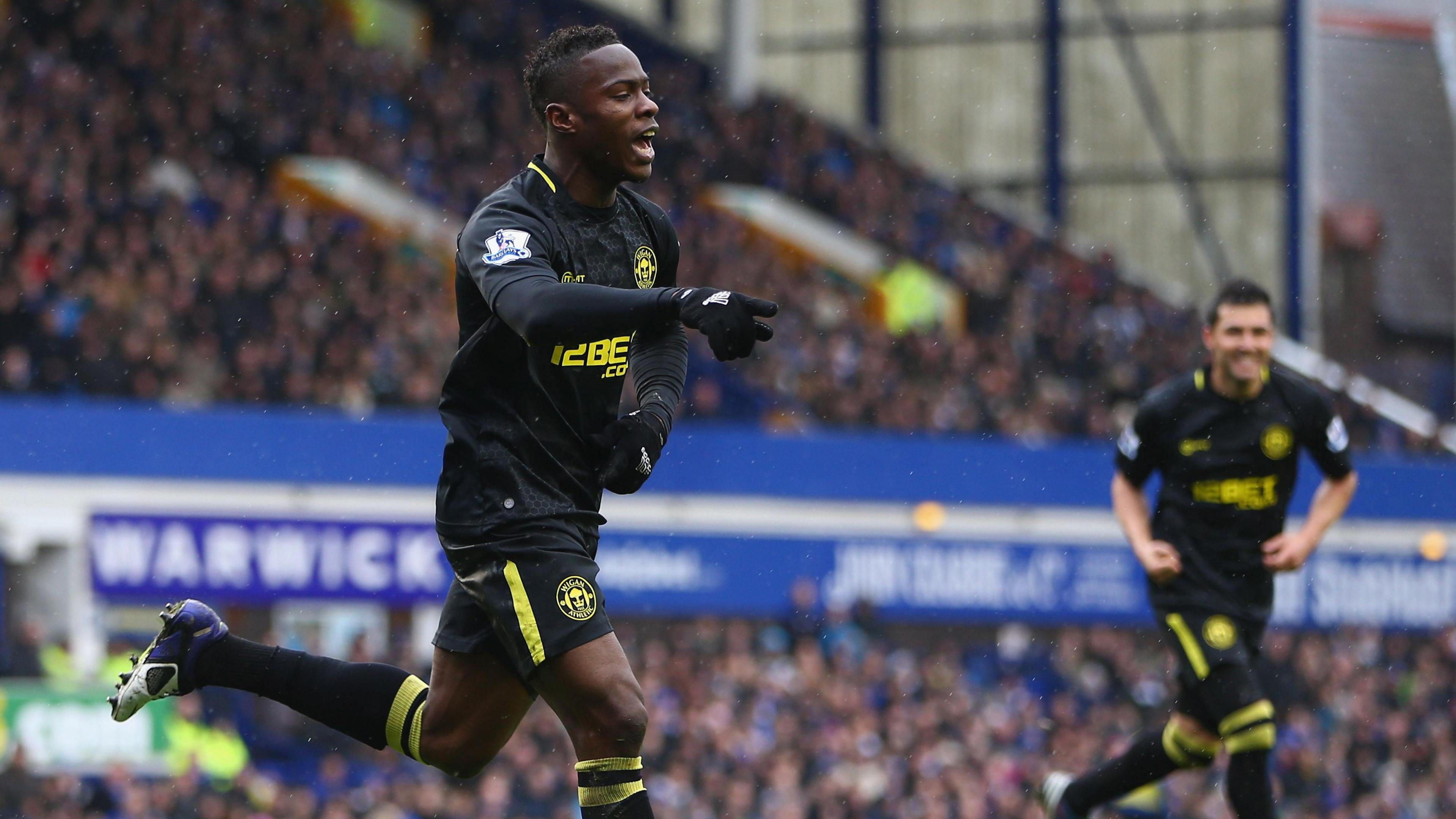 Wigan defender Manor Figueroa celebrates scoring against Everton in an FA Cup game in 2013