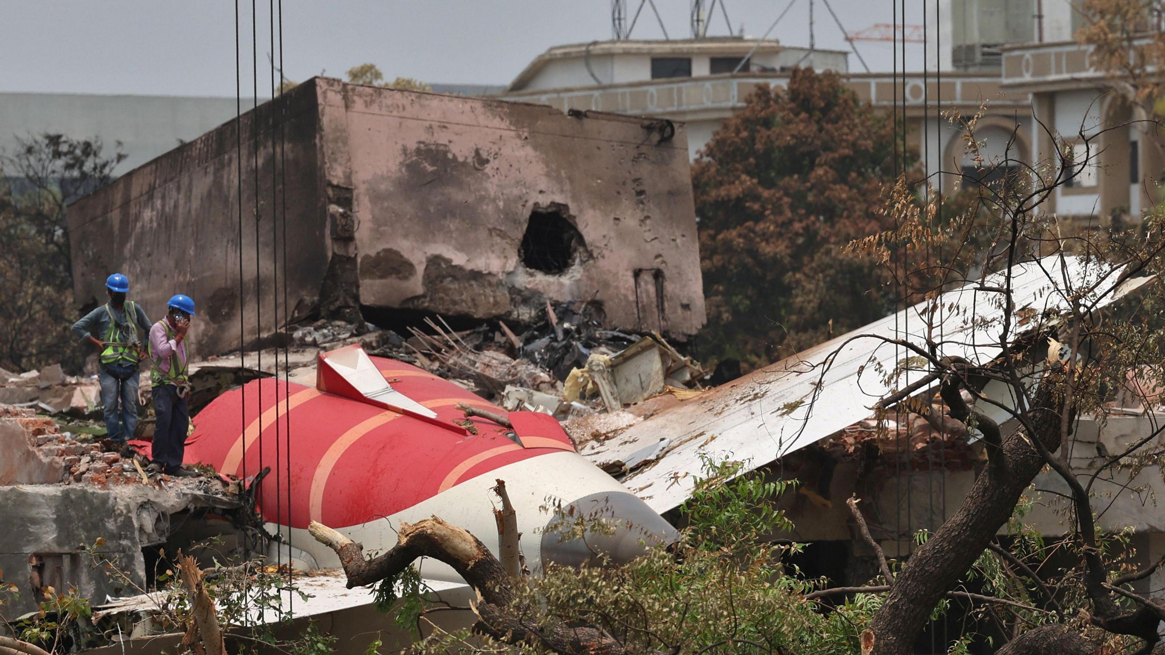 Members of Indian Army's engineering arm prepare to remove the wreckage of an Air India aircraft, bound for London's Gatwick Airport, which crashed during take-off from an airport in Ahmedabad, India June 14, 2025. REUTERS/Amit Dave