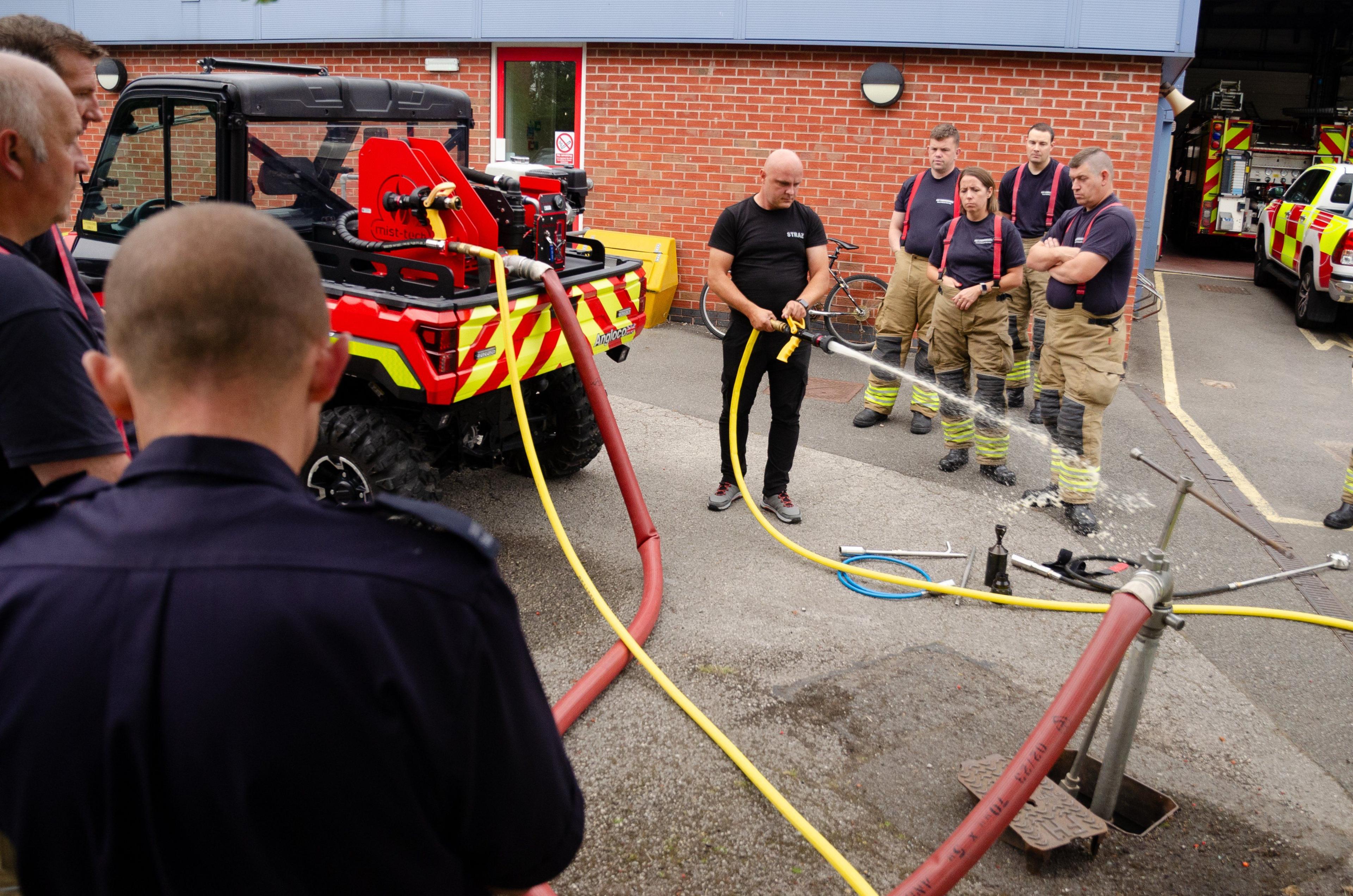 Tuxford firefighters training with the misting unit