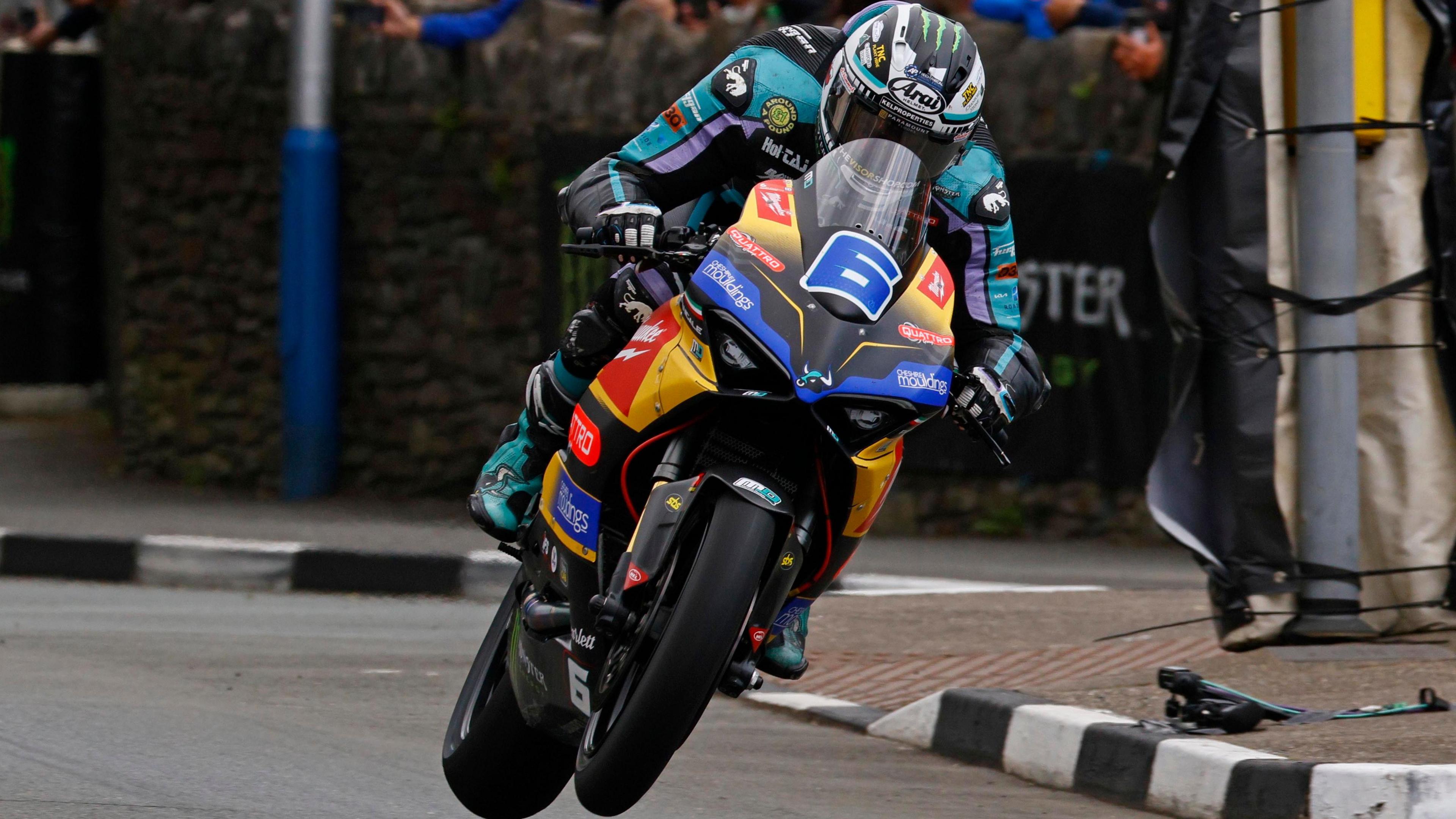 Michael Dunlop on board his V2 Ducati