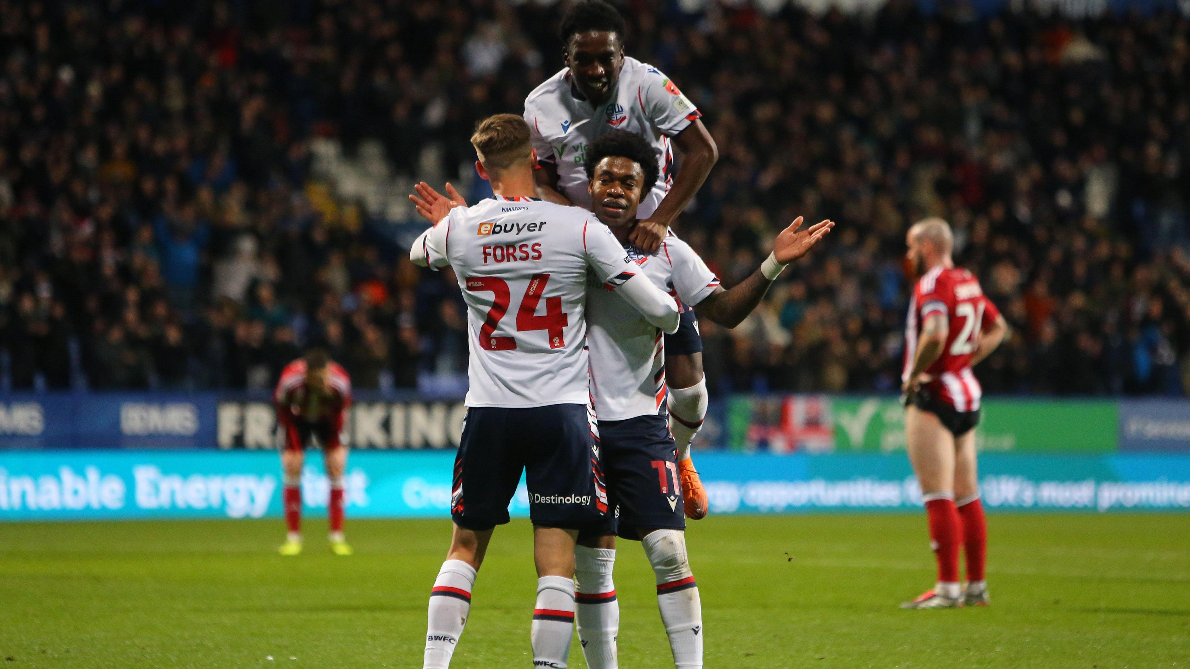 Bolton players celebrate with goalscorer Thierry Gale