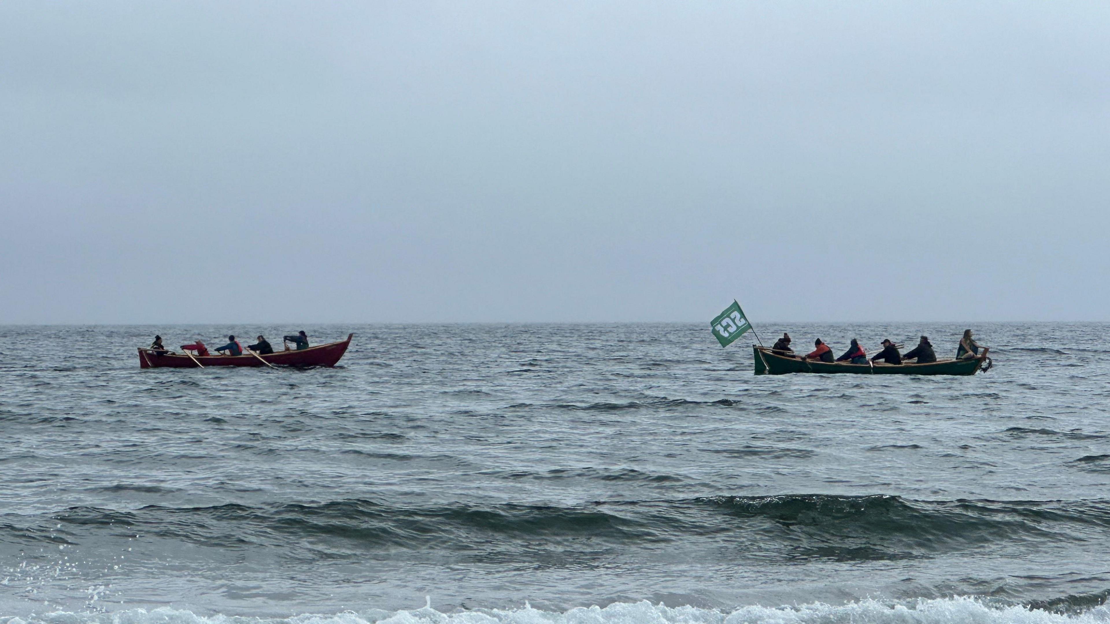 Two skiff on the water