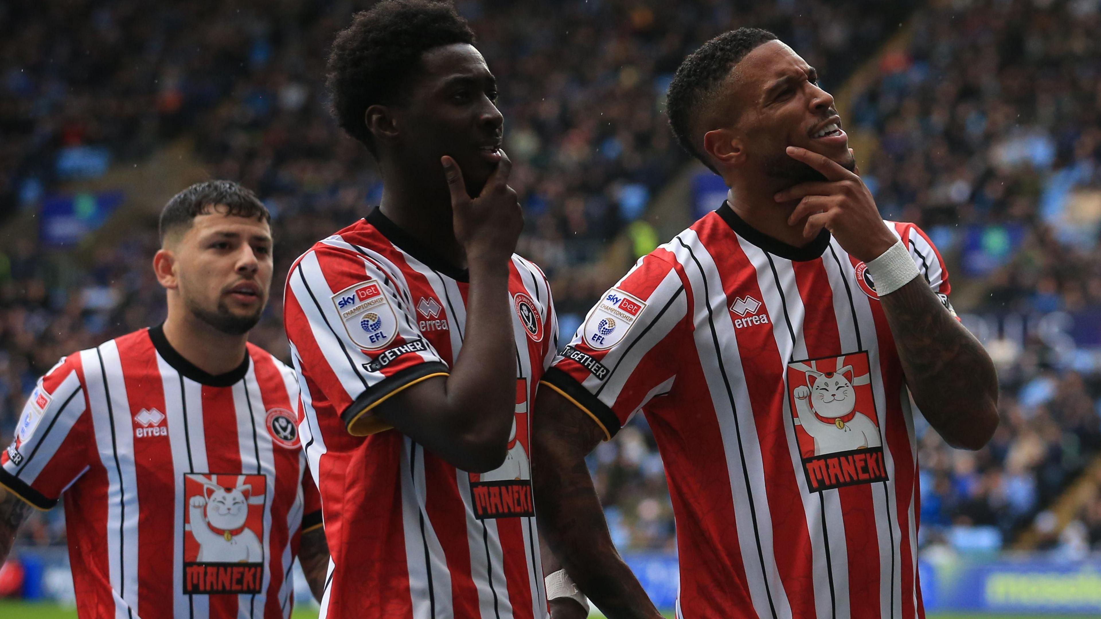 Coventry old boy Gustavo Hamer helps celebrate at the CBS Arena with Sheffield United's two first-half scorers Jesurun Rak-Sakyi (centre) and Tyrese Campbell (right)