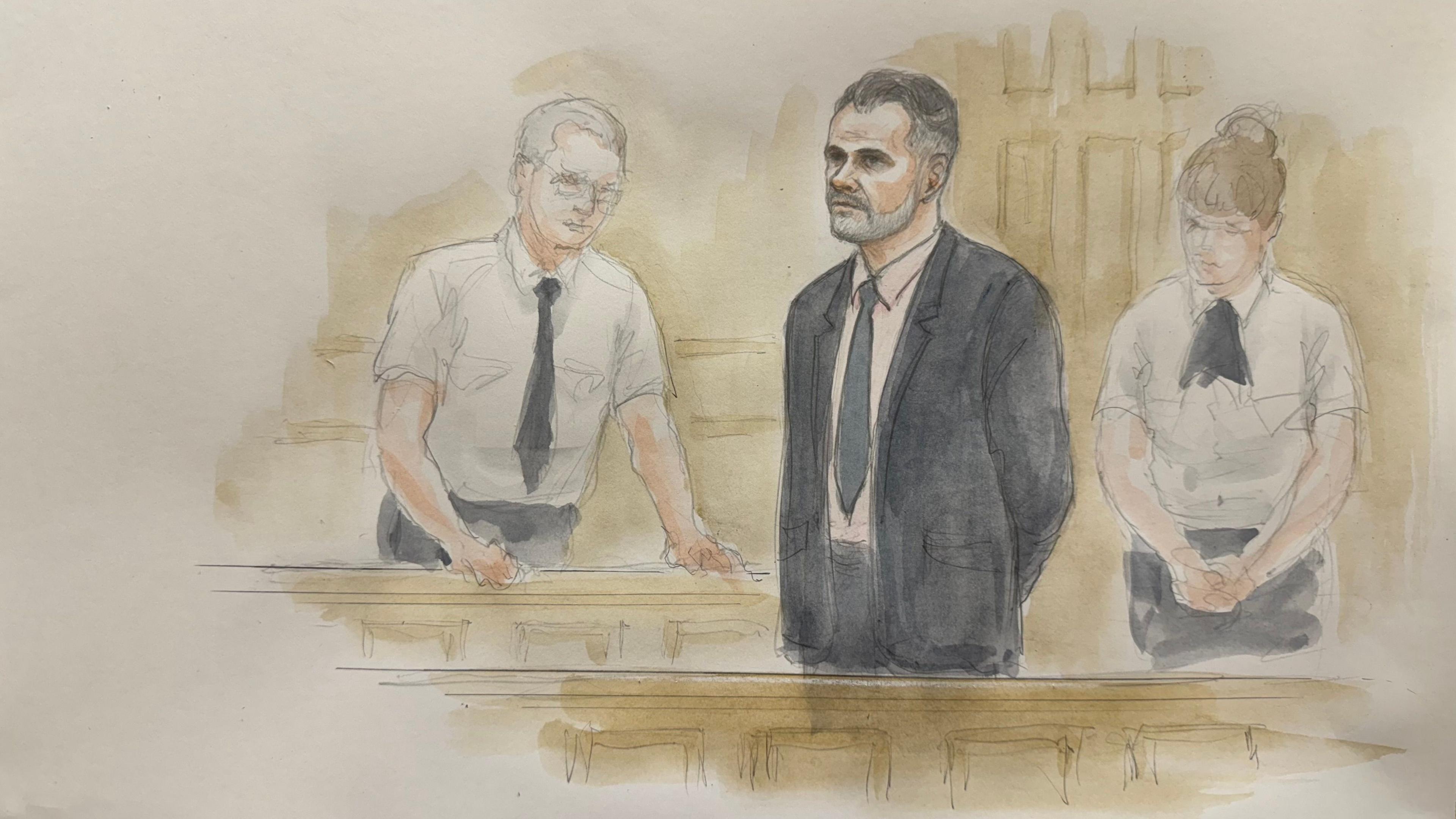 Court drawing of a man in a black suit in the dock, with a male prison officer on one side and a female on the other