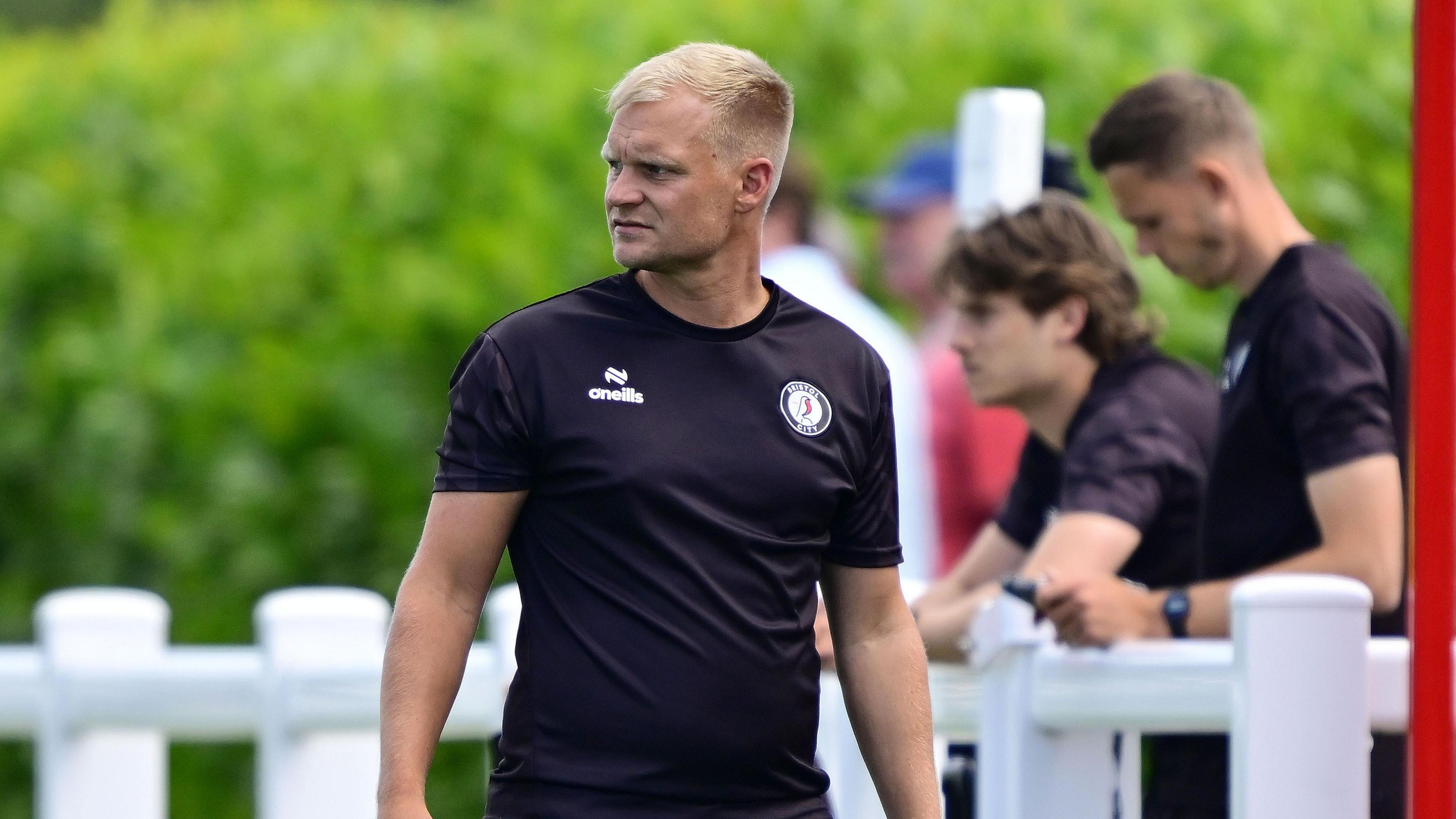 Liam Manning on the sidelines during pre-season match