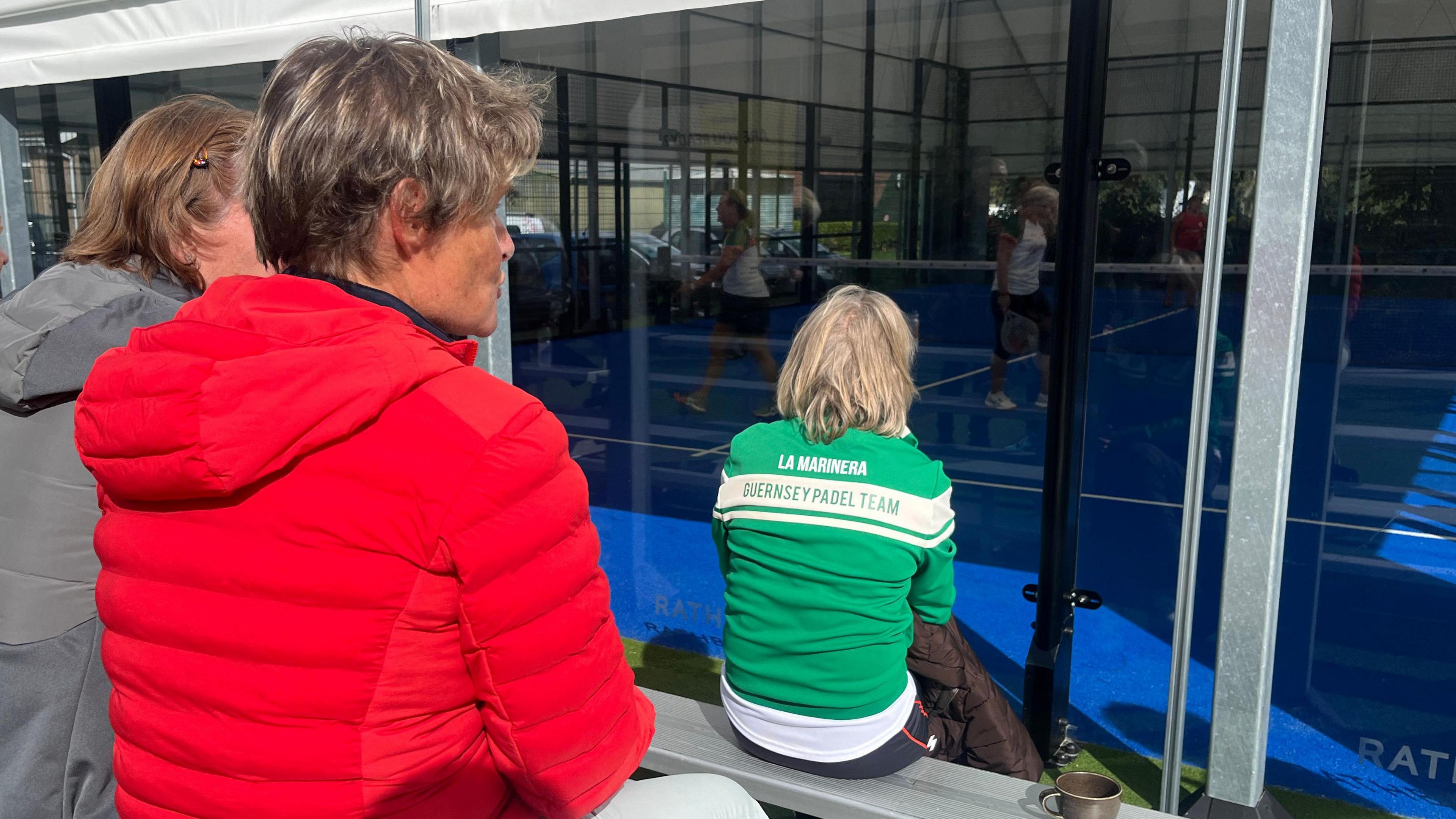 People watching the inter-insular padel at Island Padel in Jersey