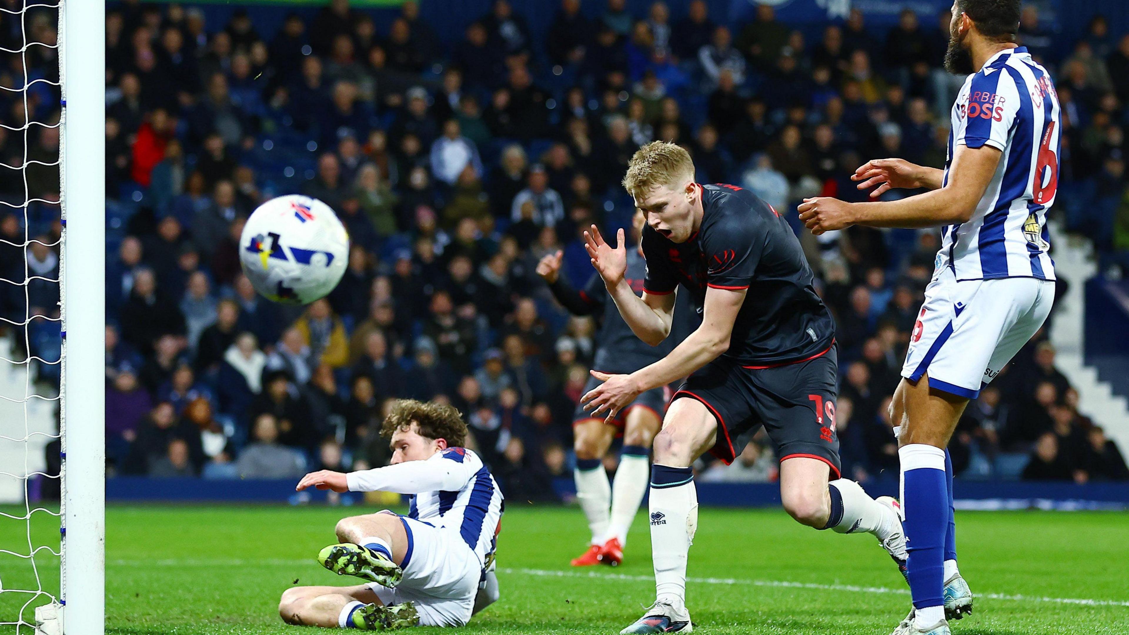 Josh Coburn reacts after shooting wide for Millwall