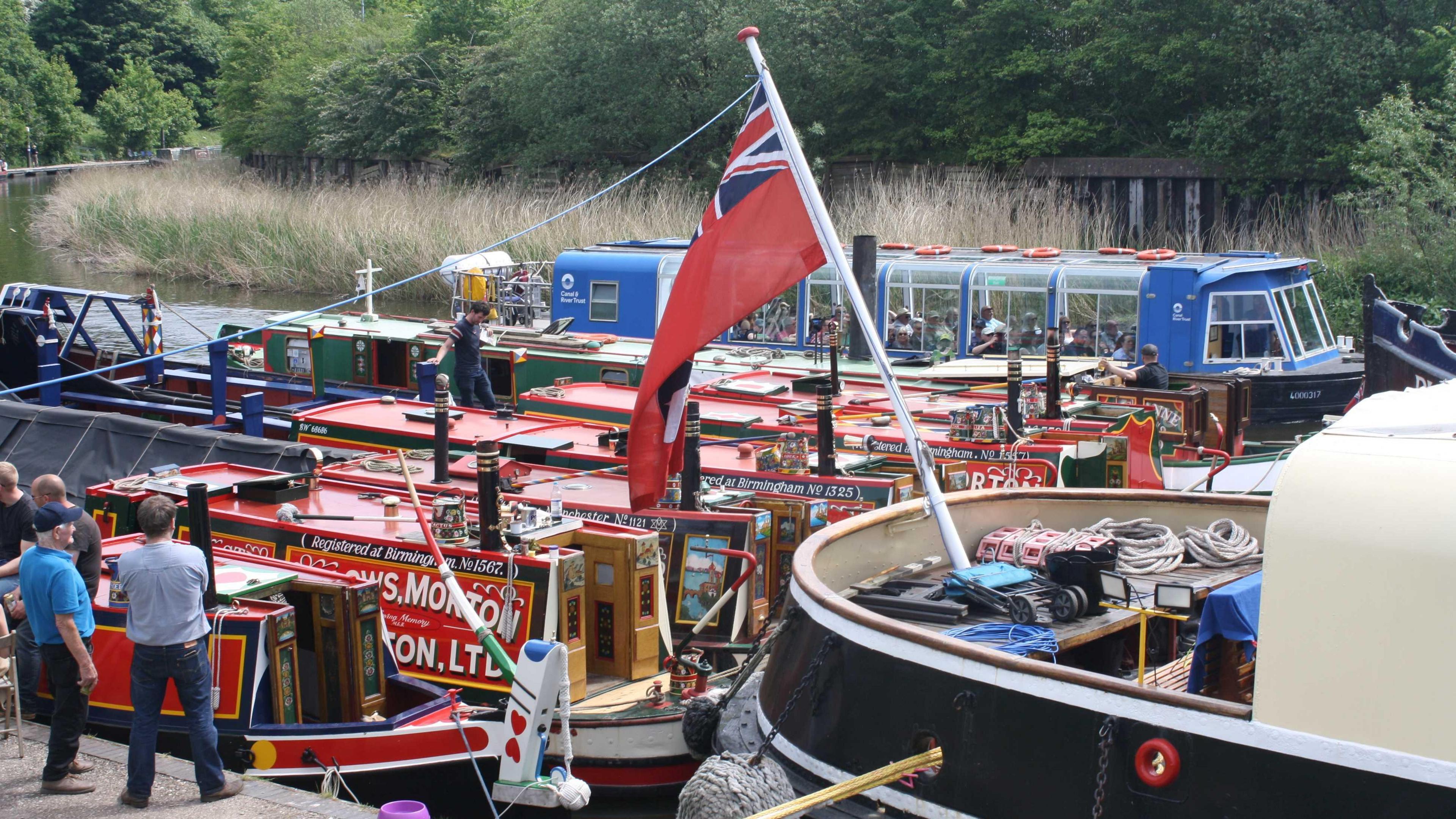 People watch the steamboats