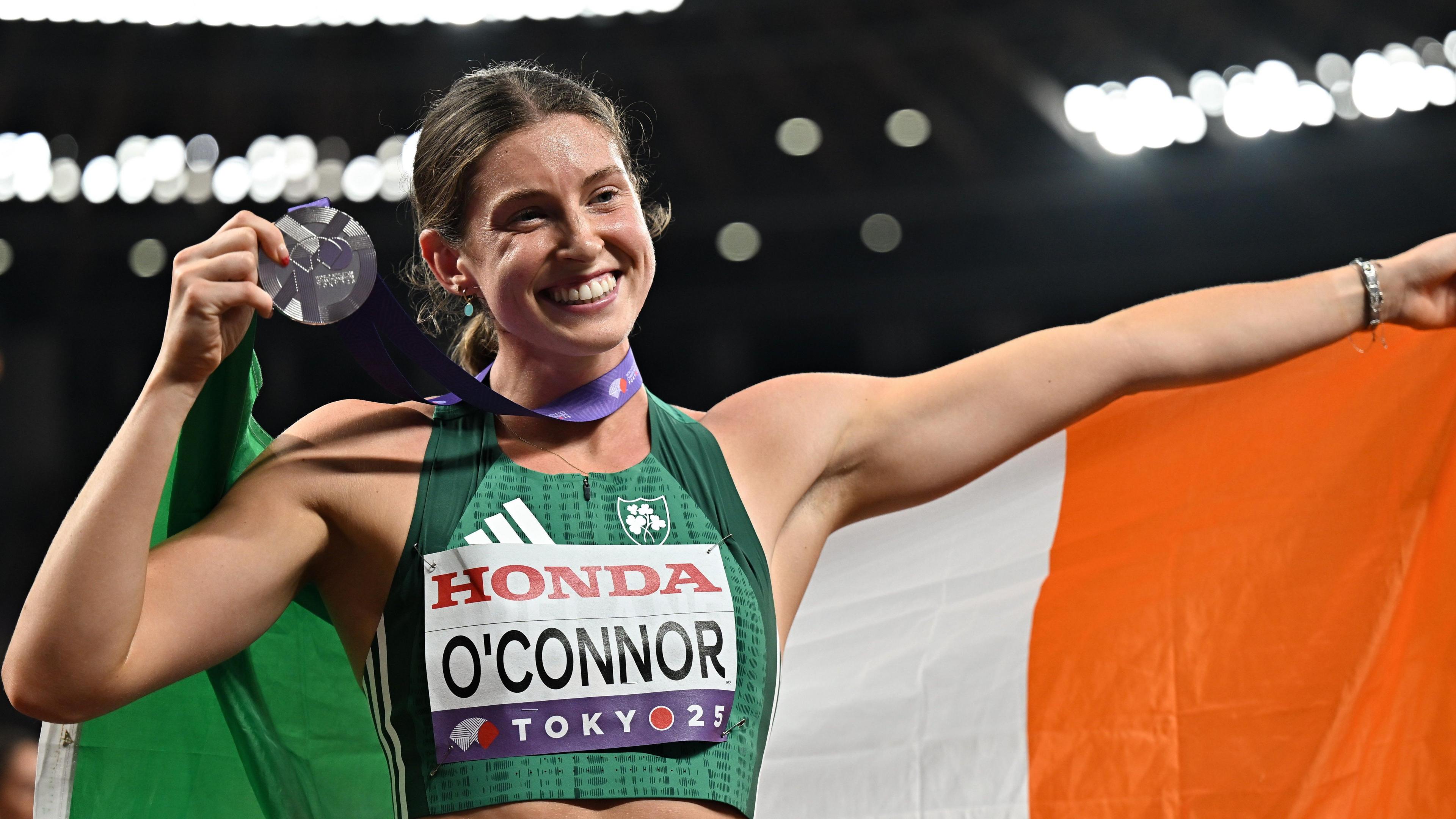 Kate O'Connor poses with her silver medal