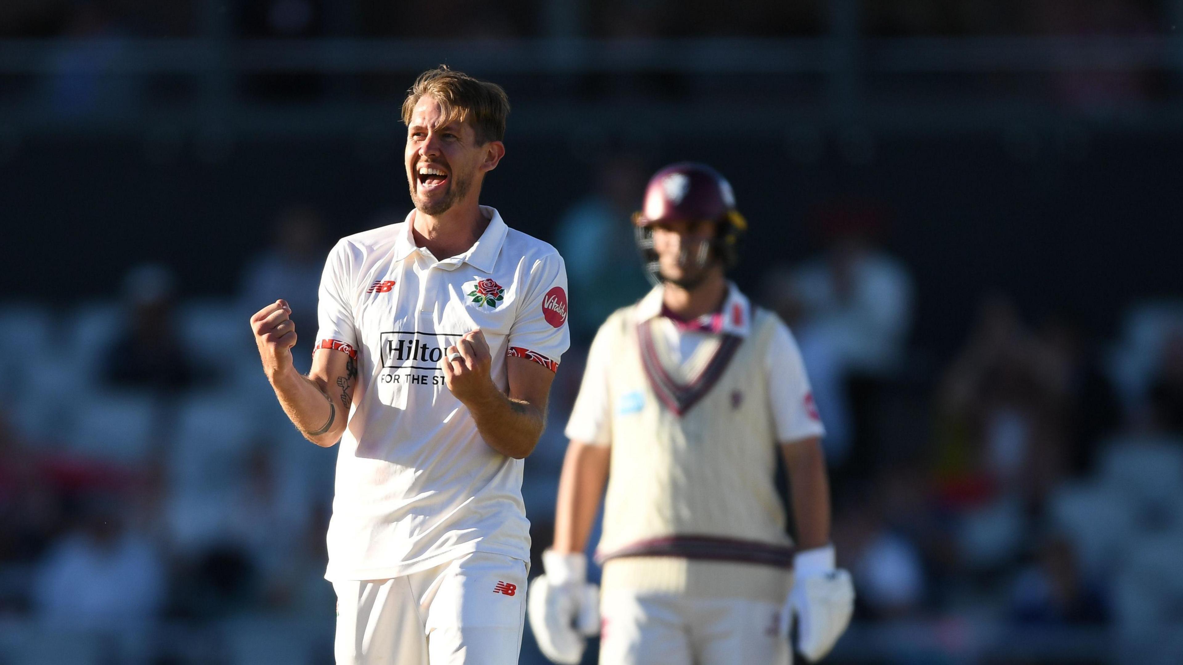 Tom Bailey celebrates a wicket