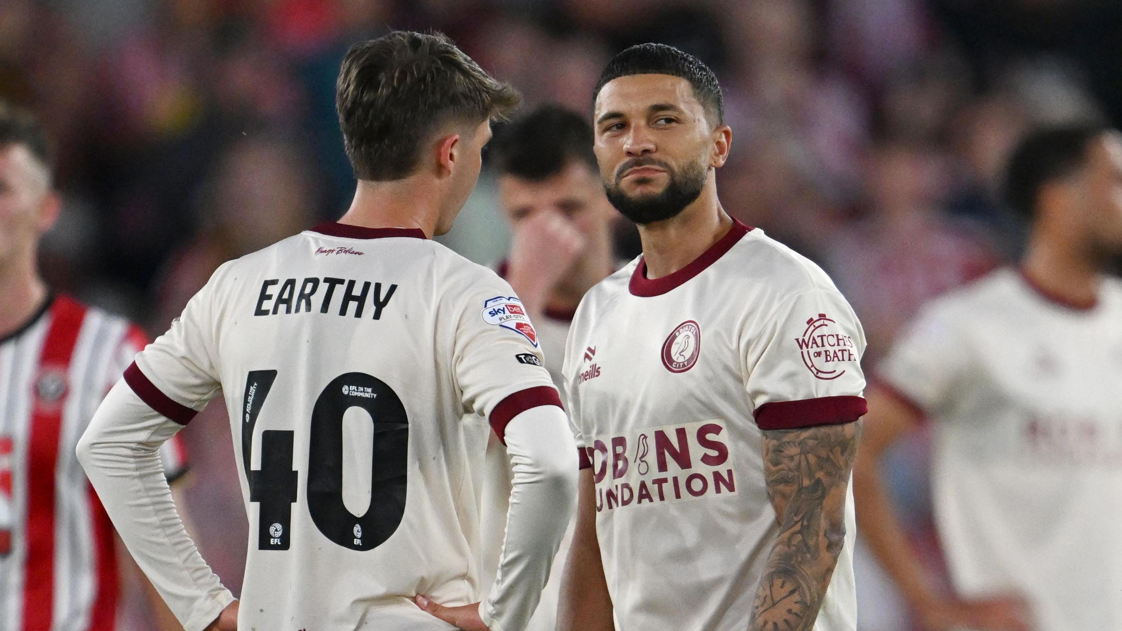 Nahki Wells (right) on the pitch following defeat by Sheffield United