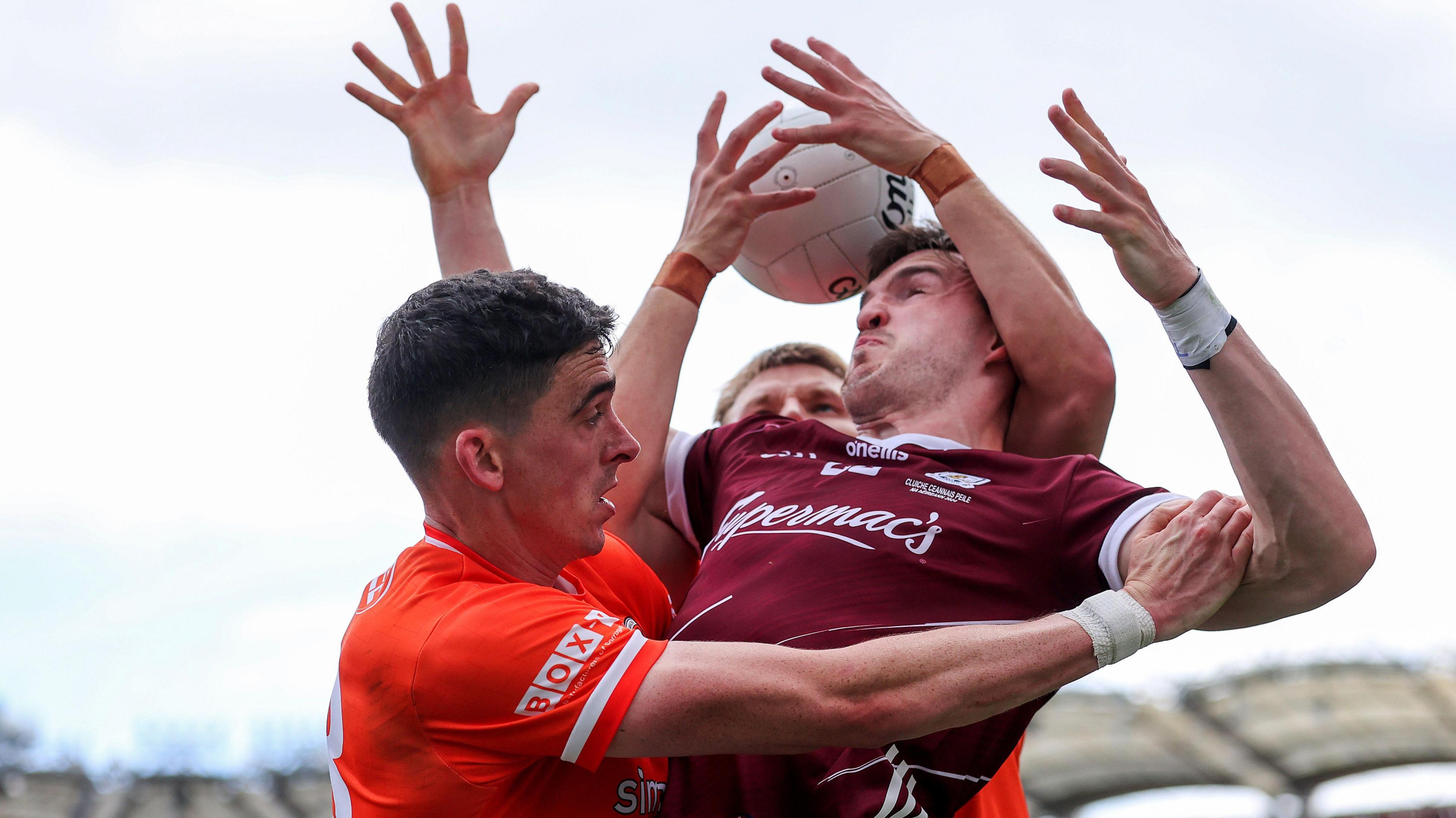 Armagh's Rory Grugan and Rian O'Neill challenge Galway's Cein Darcy in the All-Ireland Final in July