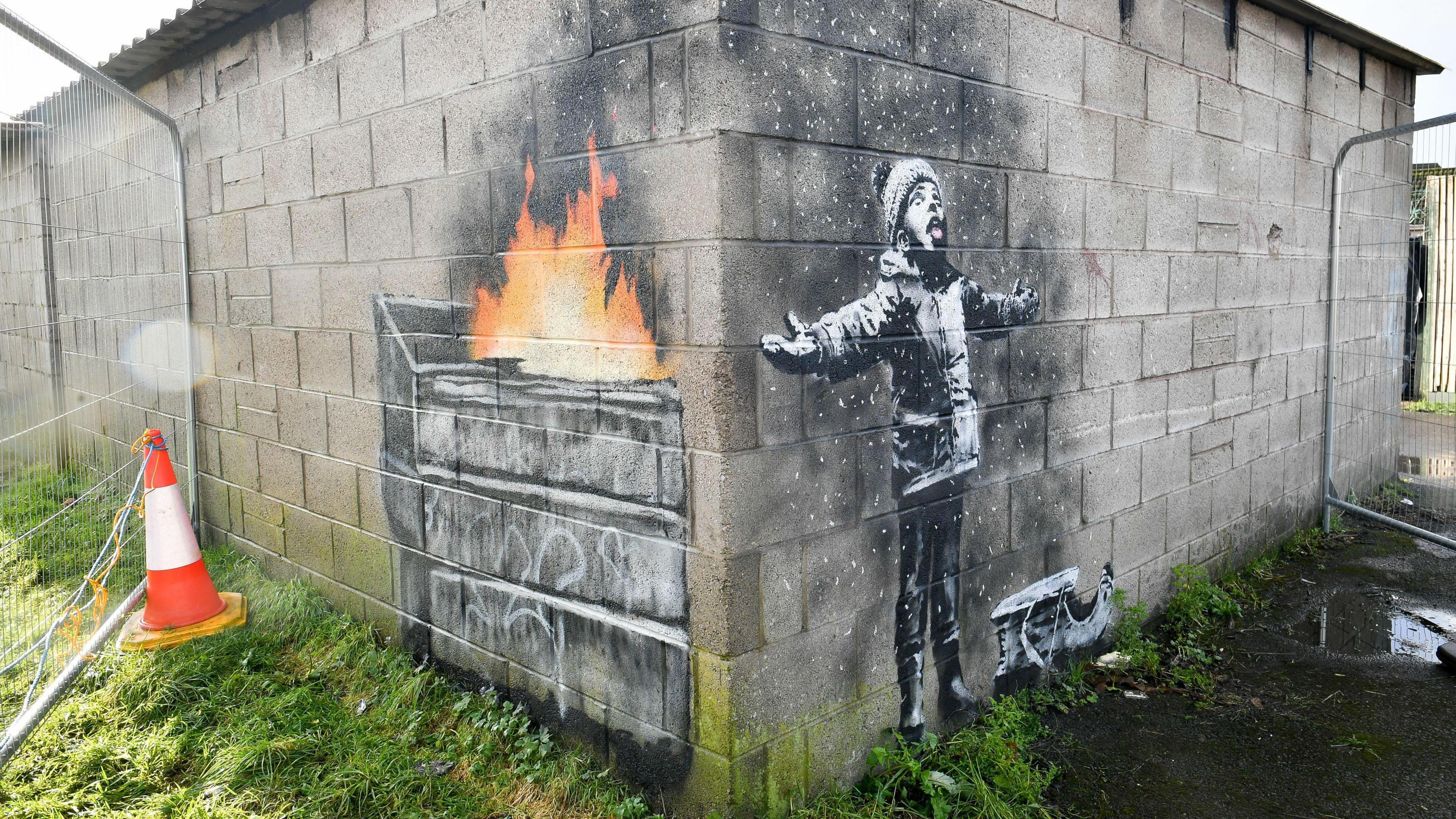 Banksy artwork on a garage in Port Talbot.