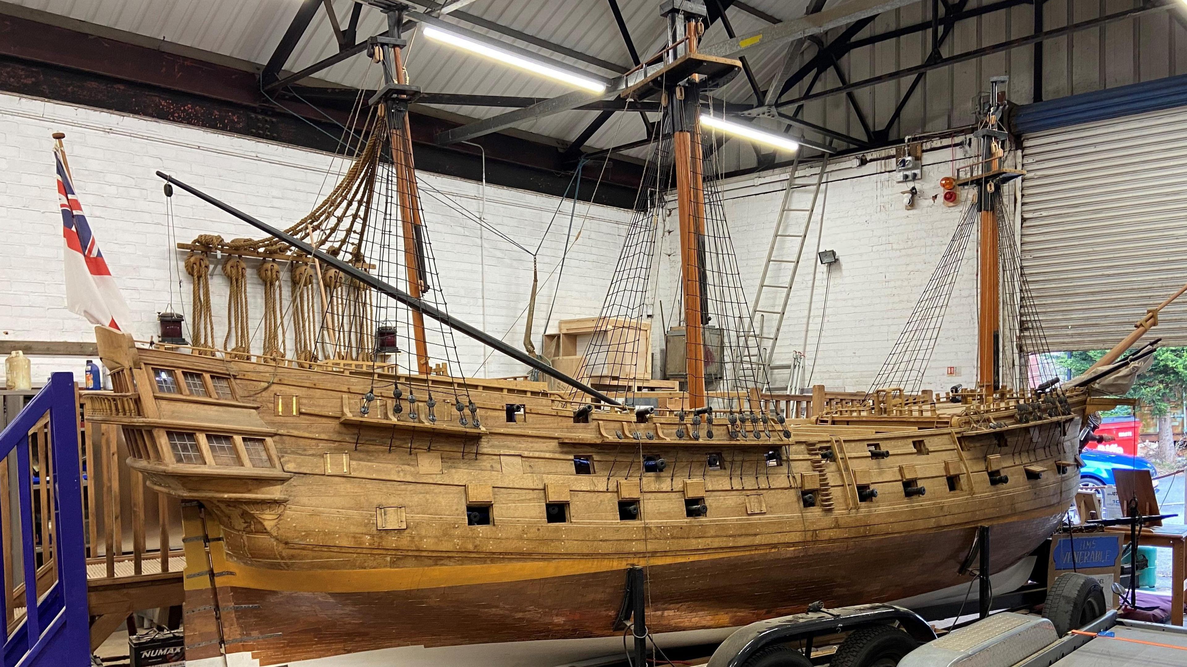 The wooden model of HMS Venerable at the charity's workshop.