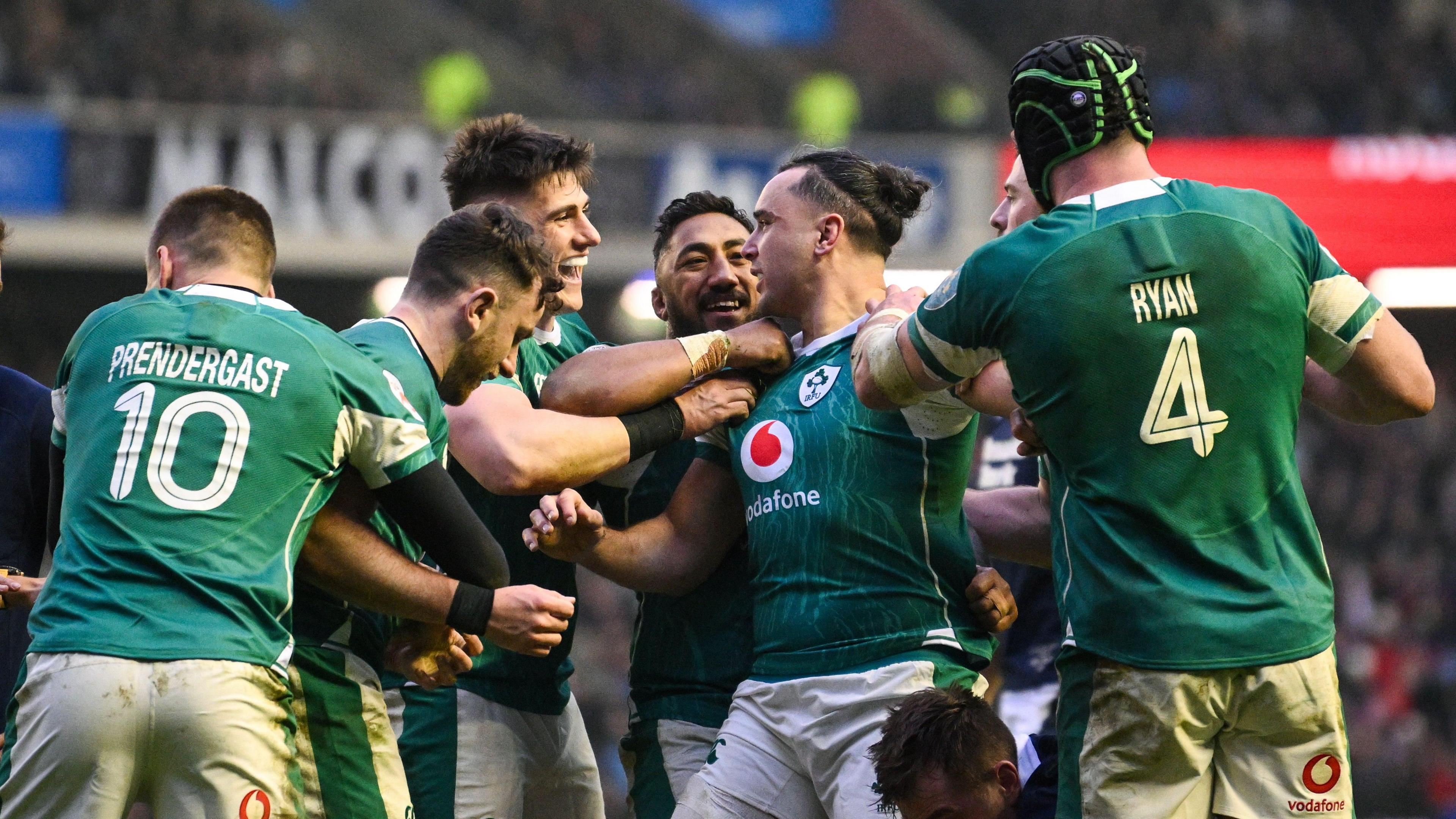 Ireland players celebrate a try against Scotland