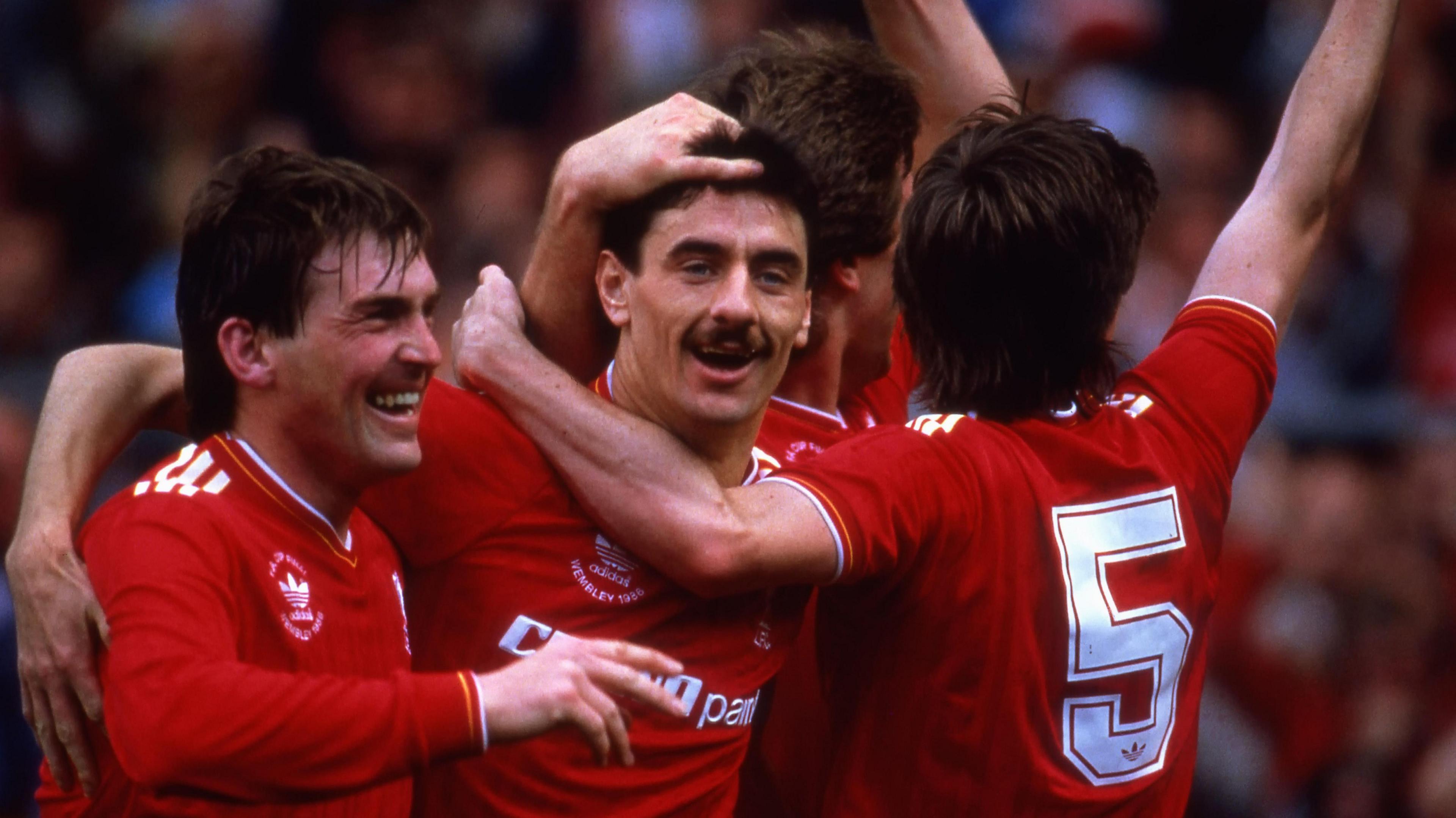 Liverpool's Ian Rush and Kenny Dalglish celebrate in 1986