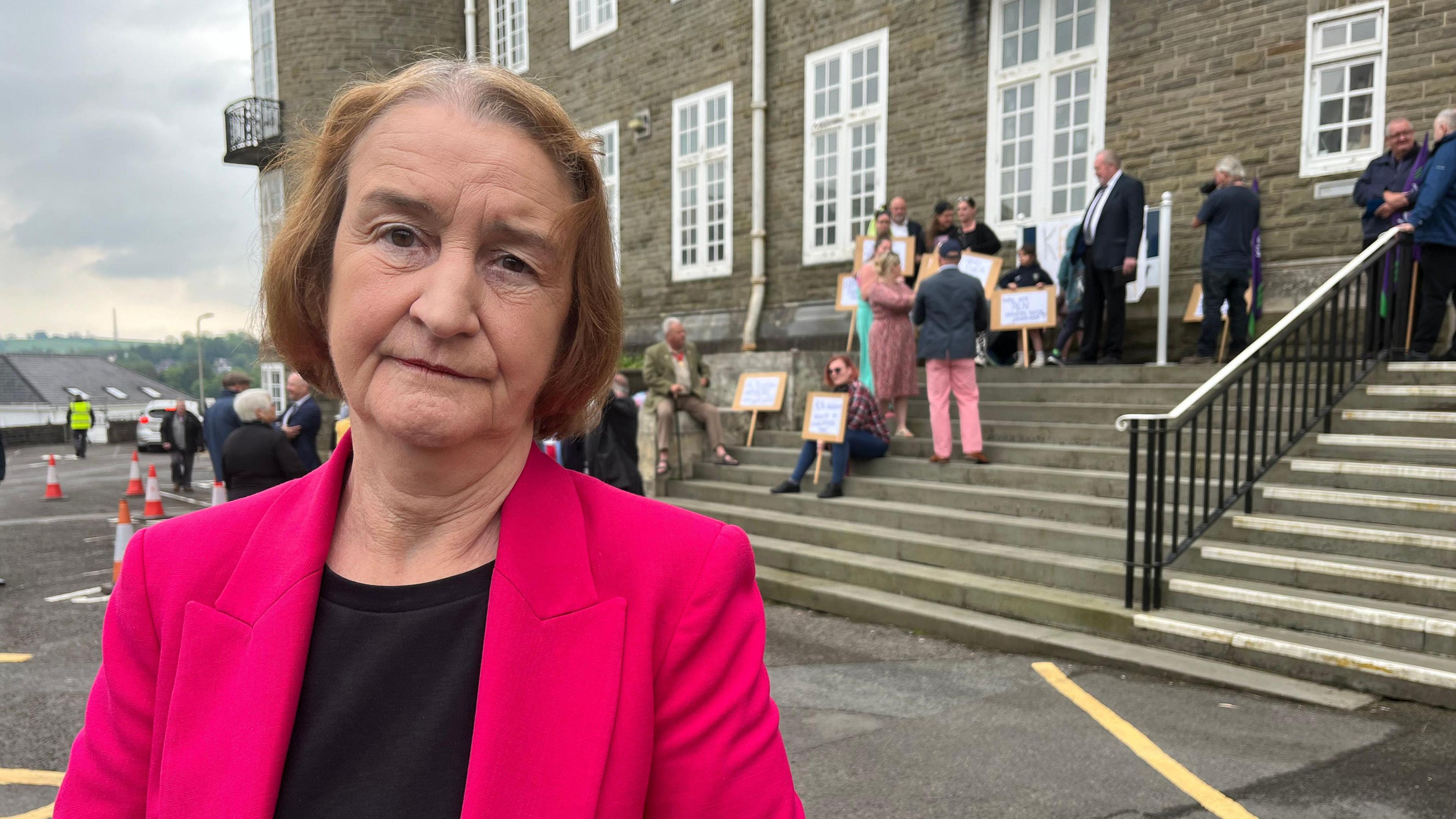 Nia Griffith stands outside Carmarthenshire County Hall