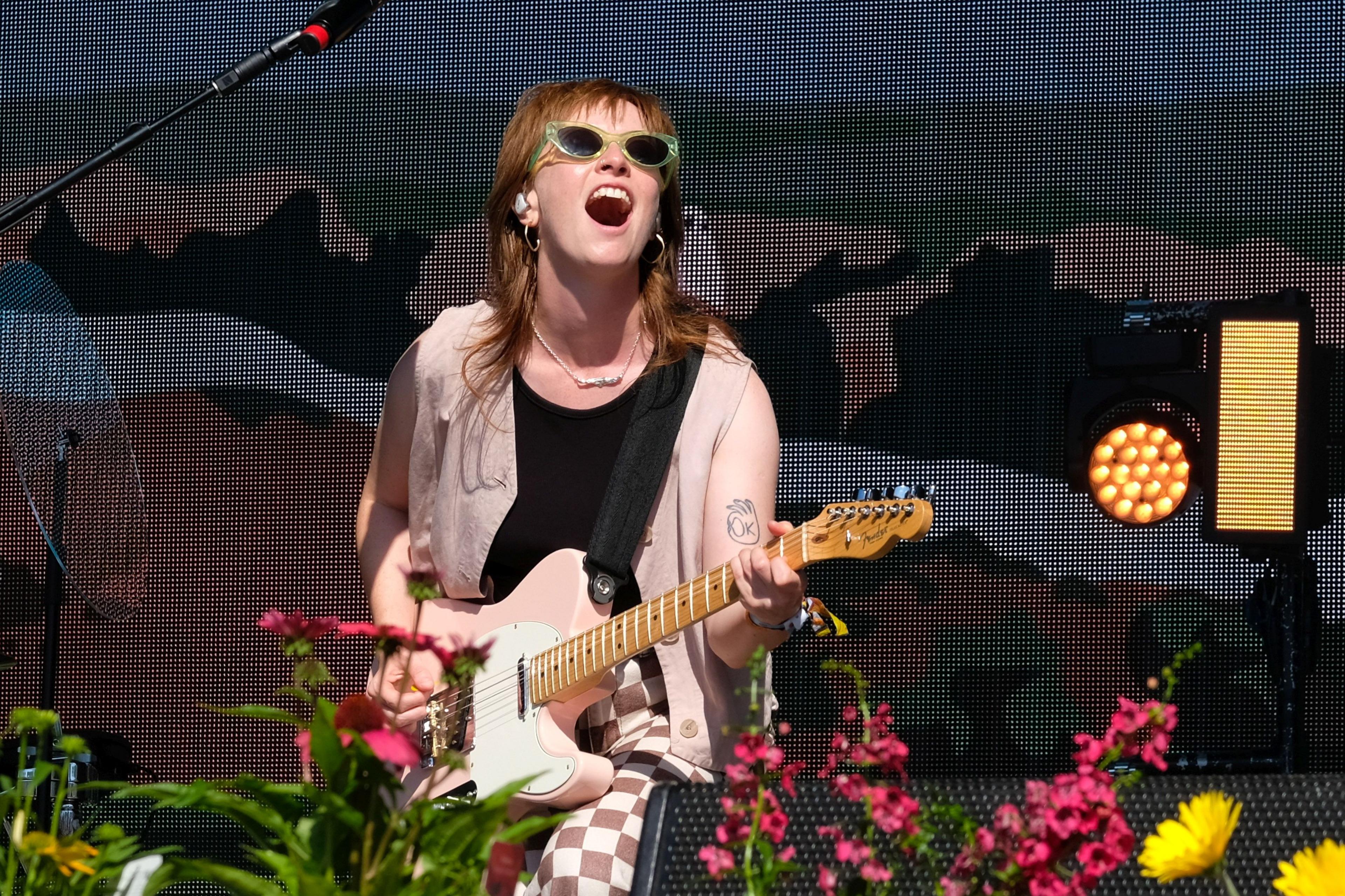 Orla Gartland performs on stage at a festival in 2022