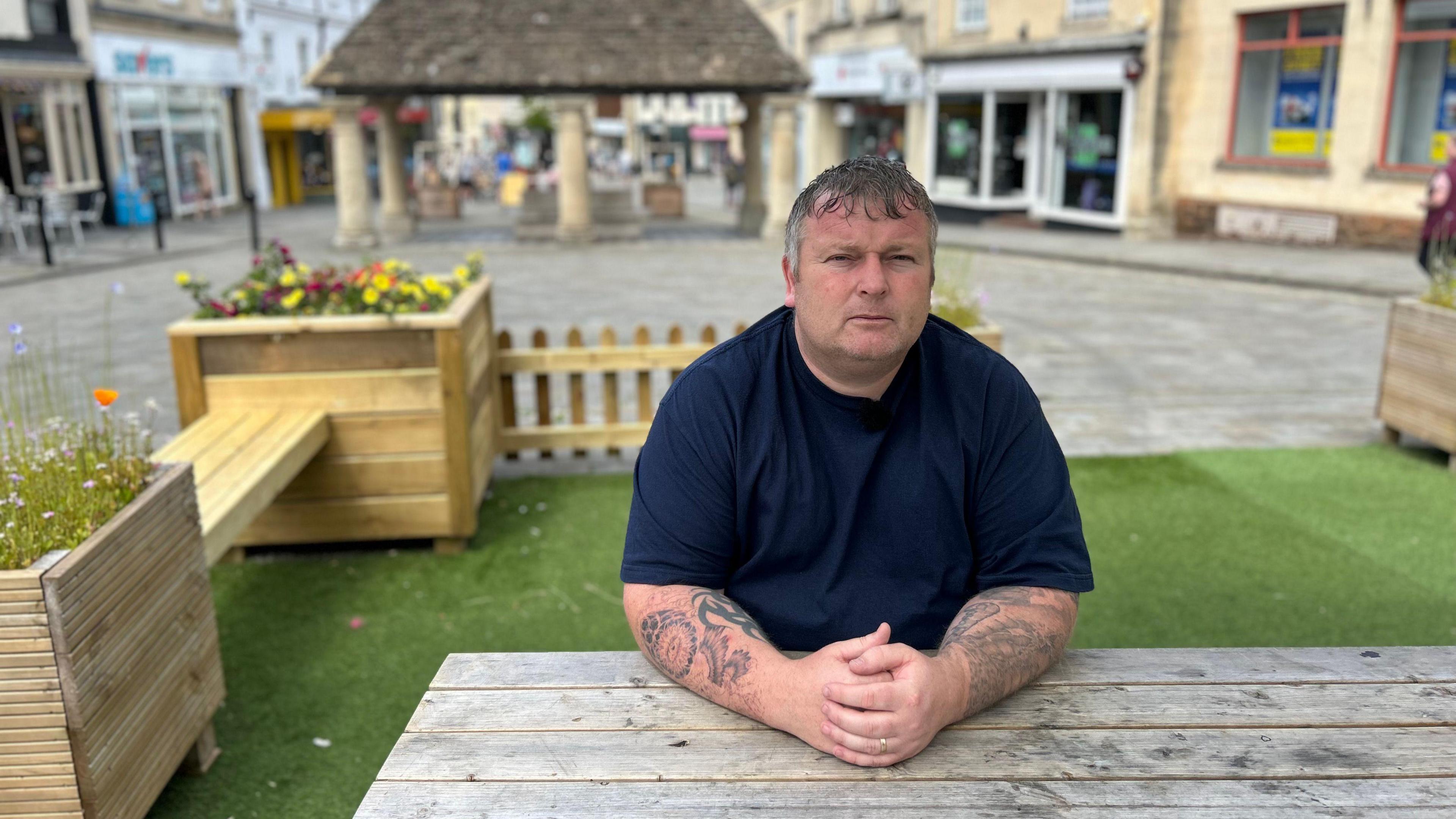  Liam Lathbury sitting at a table in Chippenham