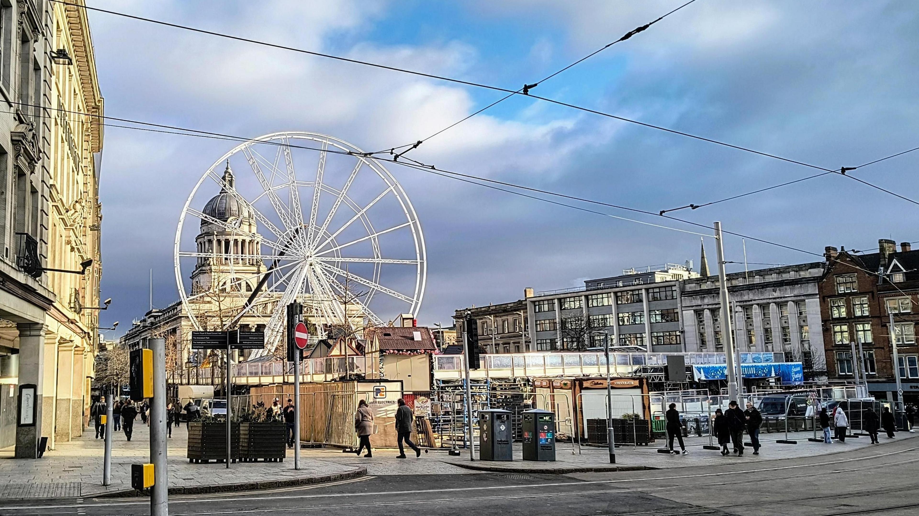 Photo showing Nottingham's Old Market Square in December with the big wheel visible