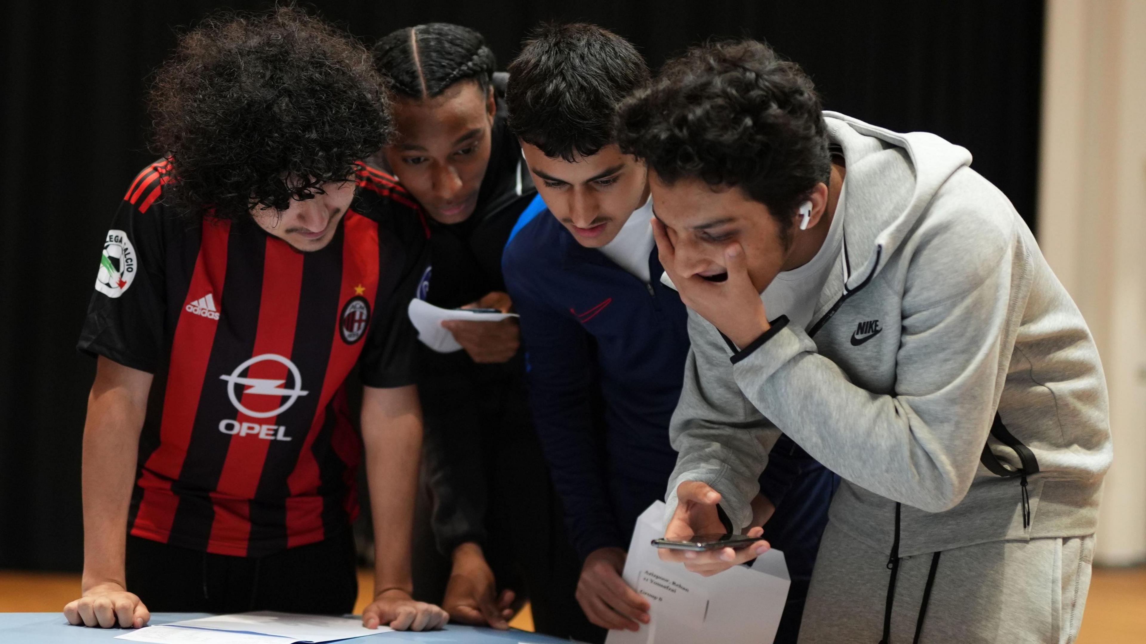 Students at Ark Pioneer Academy, Barnet, north London, receive their GCSE results  